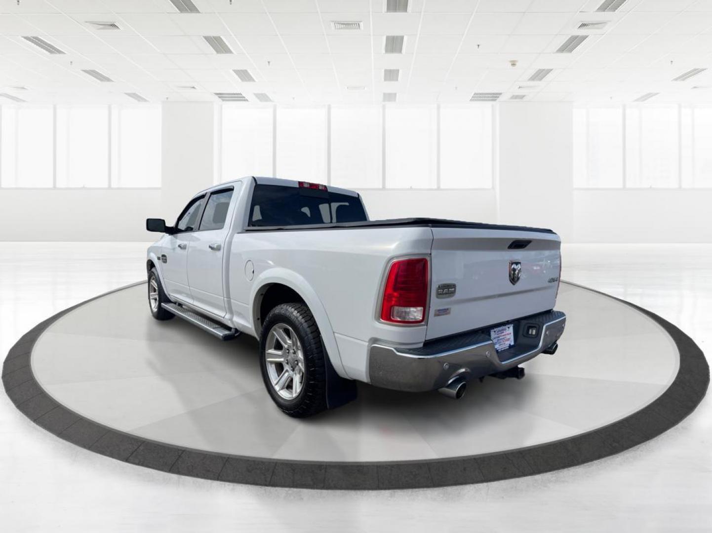 2014 Ram 1500 Longhorn (1C6RR7WT2ES) with an HEMI engine, located at 4508 South Dixie Dr, Moraine, OH, 45439, (937) 908-9800, 39.689976, -84.218452 - Photo#4