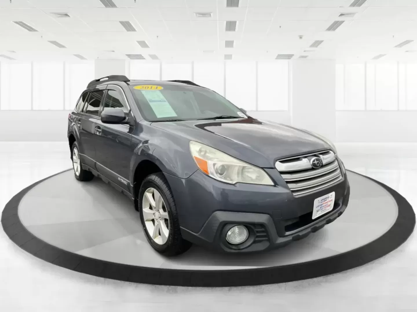 2014 Subaru Outback 2.5i Premium (4S4BRCDC0E3) with an 2.5L H-4 DOHC engine, located at 8750 N County Rd 25A, Piqua, OH, 45356, (937) 908-9800, 40.164391, -84.232513 - Photo#0