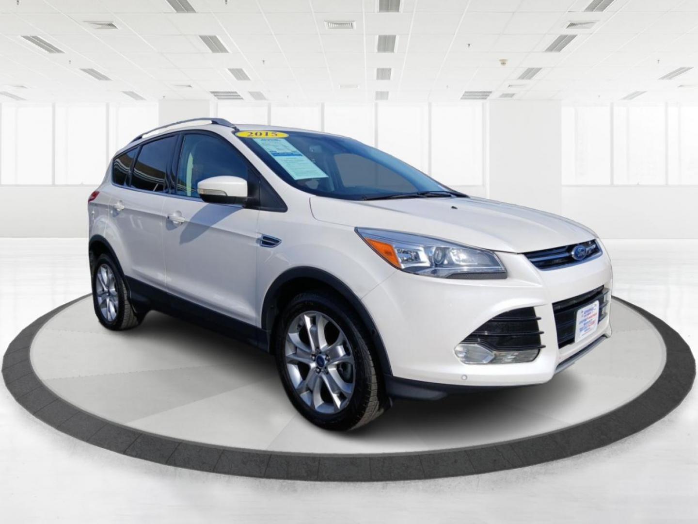 2015 Ford Escape Titanium 4WD (1FMCU9J93FU) with an 2.0L L4 DOHC 16V engine, 6-Speed Automatic transmission, located at 1184 Kauffman Ave, Fairborn, OH, 45324, (937) 908-9800, 39.807072, -84.030914 - Photo#0