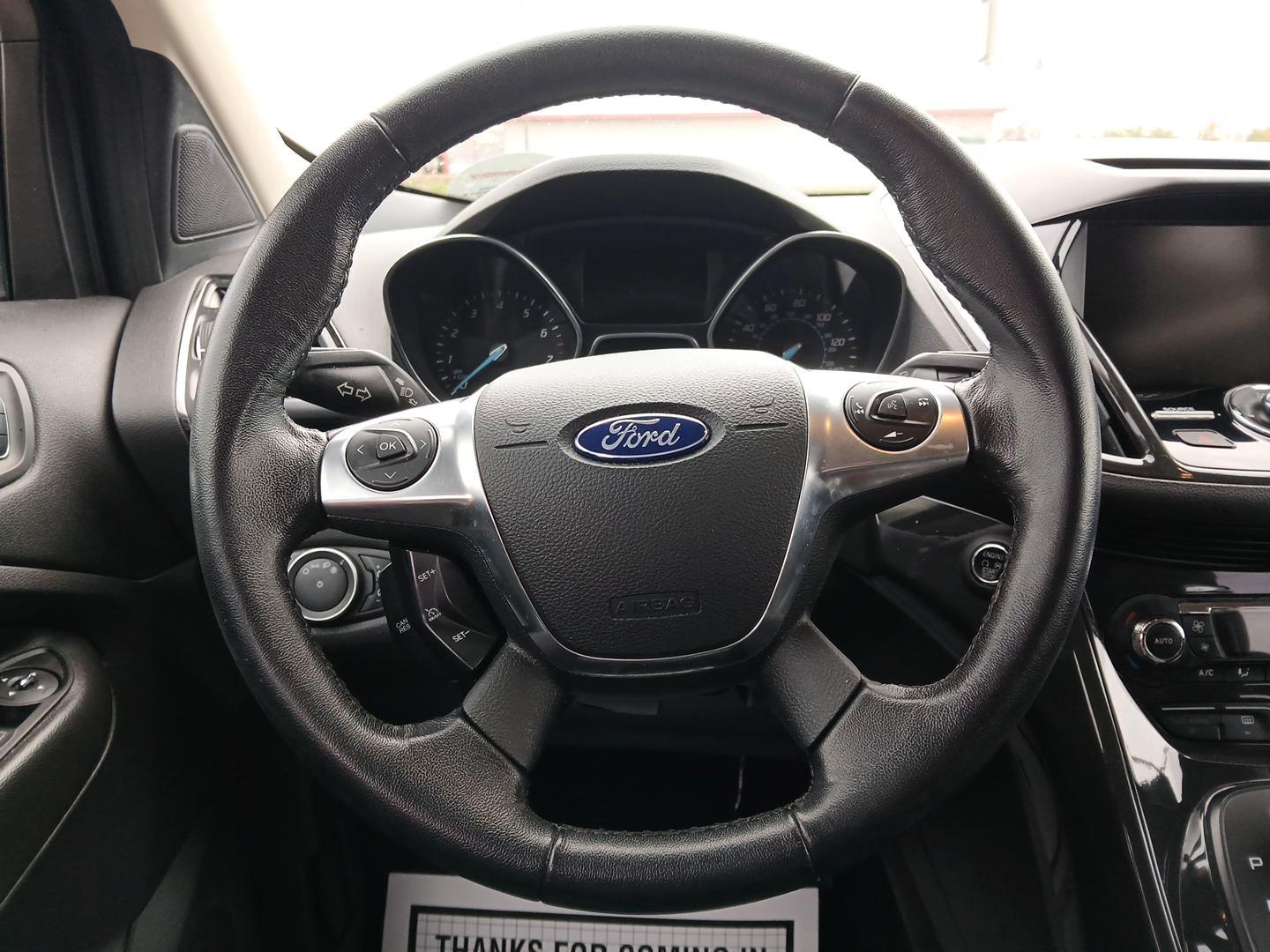 2015 Ford Escape Titanium 4WD (1FMCU9J92FU) with an 2.0L L4 DOHC 16V engine, 6-Speed Automatic transmission, located at 1951 S Dayton Lakeview Rd., New Carlisle, OH, 45344, (937) 908-9800, 39.890999, -84.050255 - Photo#15
