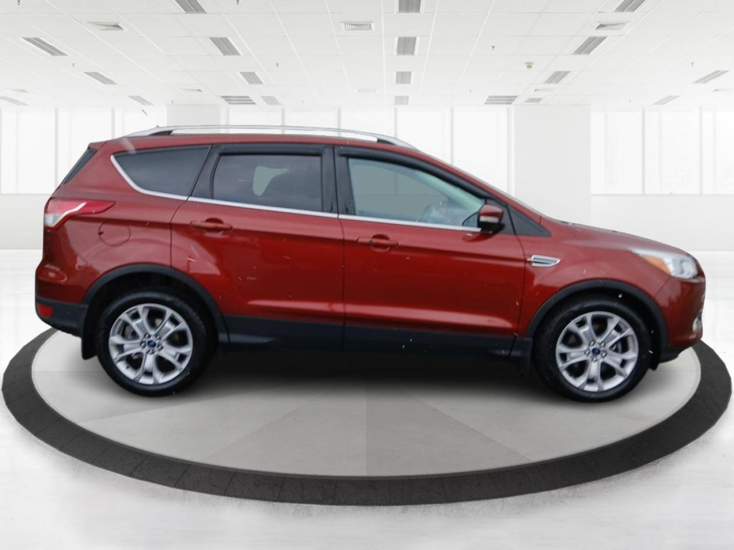2015 Ford Escape Titanium 4WD (1FMCU9J92FU) with an 2.0L L4 DOHC 16V engine, 6-Speed Automatic transmission, located at 1951 S Dayton Lakeview Rd., New Carlisle, OH, 45344, (937) 908-9800, 39.890999, -84.050255 - Photo#1