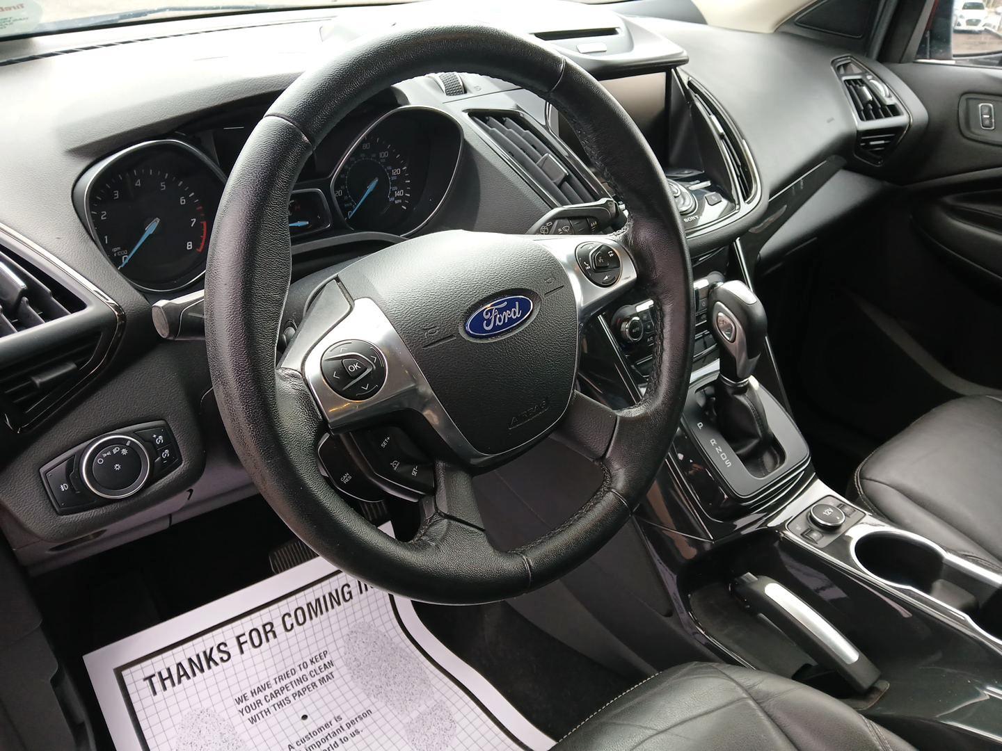 2015 Ford Escape Titanium 4WD (1FMCU9J92FU) with an 2.0L L4 DOHC 16V engine, 6-Speed Automatic transmission, located at 1951 S Dayton Lakeview Rd., New Carlisle, OH, 45344, (937) 908-9800, 39.890999, -84.050255 - Photo#8