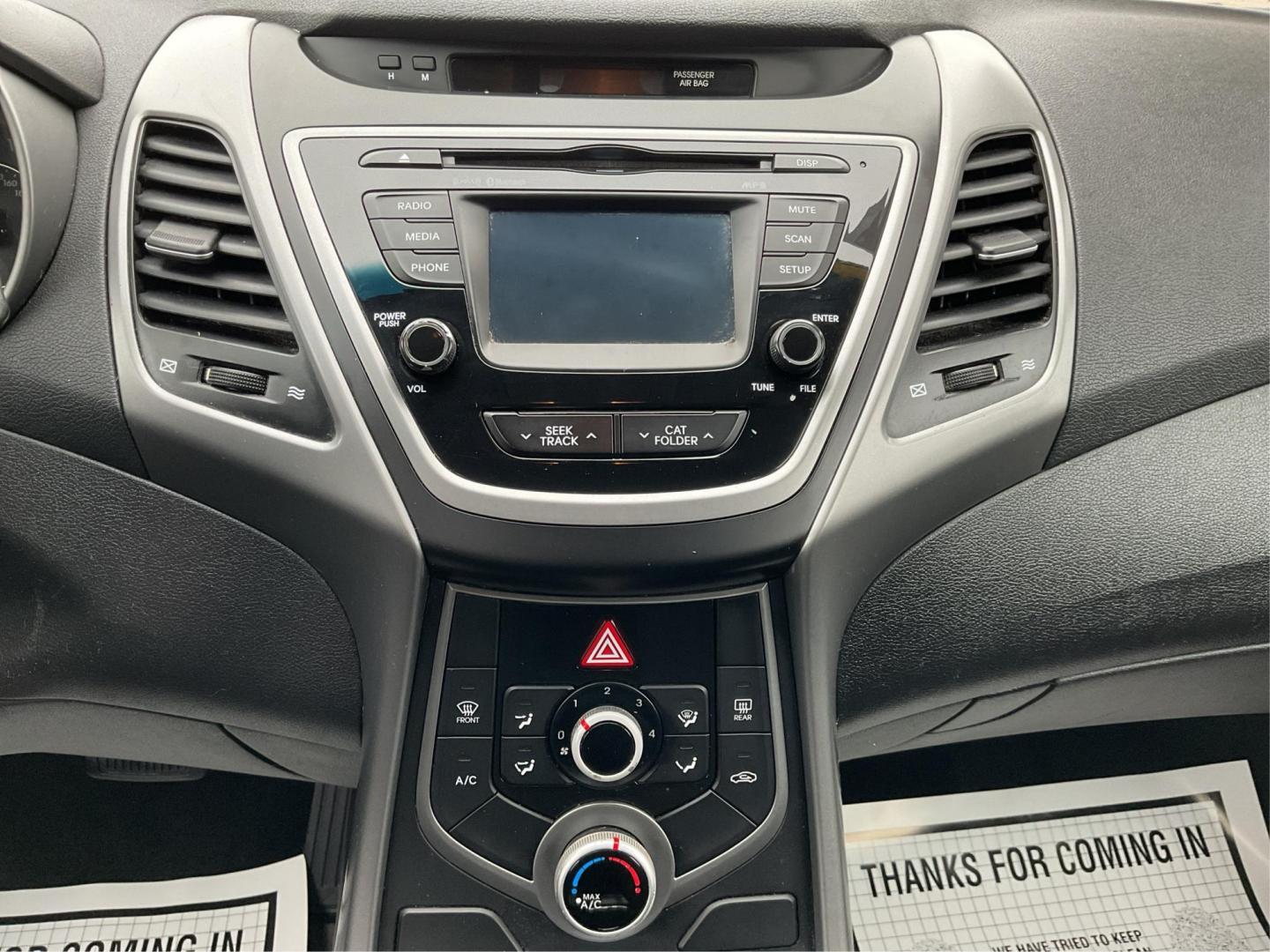2015 Hyundai Elantra SE 6AT (KMHDH4AE0FU) with an 1.8L L4 DOHC 16V engine, 6-Speed Automatic transmission, located at 880 E. National Road, Vandalia, OH, 45377, (937) 908-9800, 39.891918, -84.183594 - Photo#12