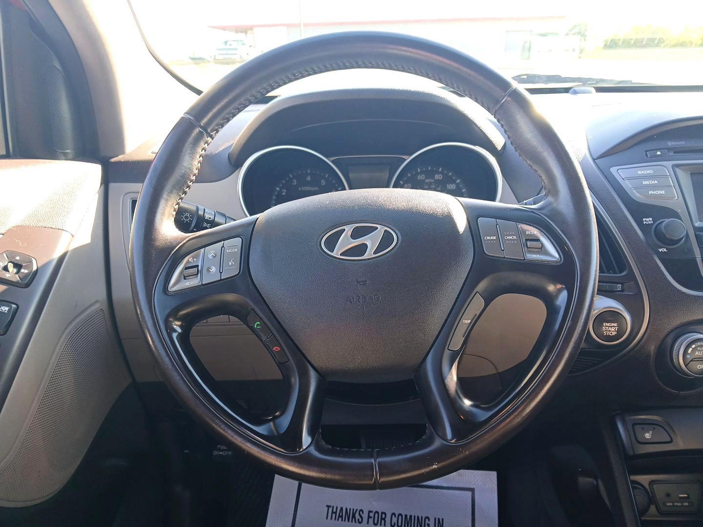2015 Hyundai Tucson Limited AWD (KM8JUCAG4FU) with an 2.4L L4 DOHC 16V engine, 6-Speed Automatic transmission, located at 1230 East Main St, Xenia, OH, 45385, (937) 908-9800, 39.688026, -83.910172 - Photo#14