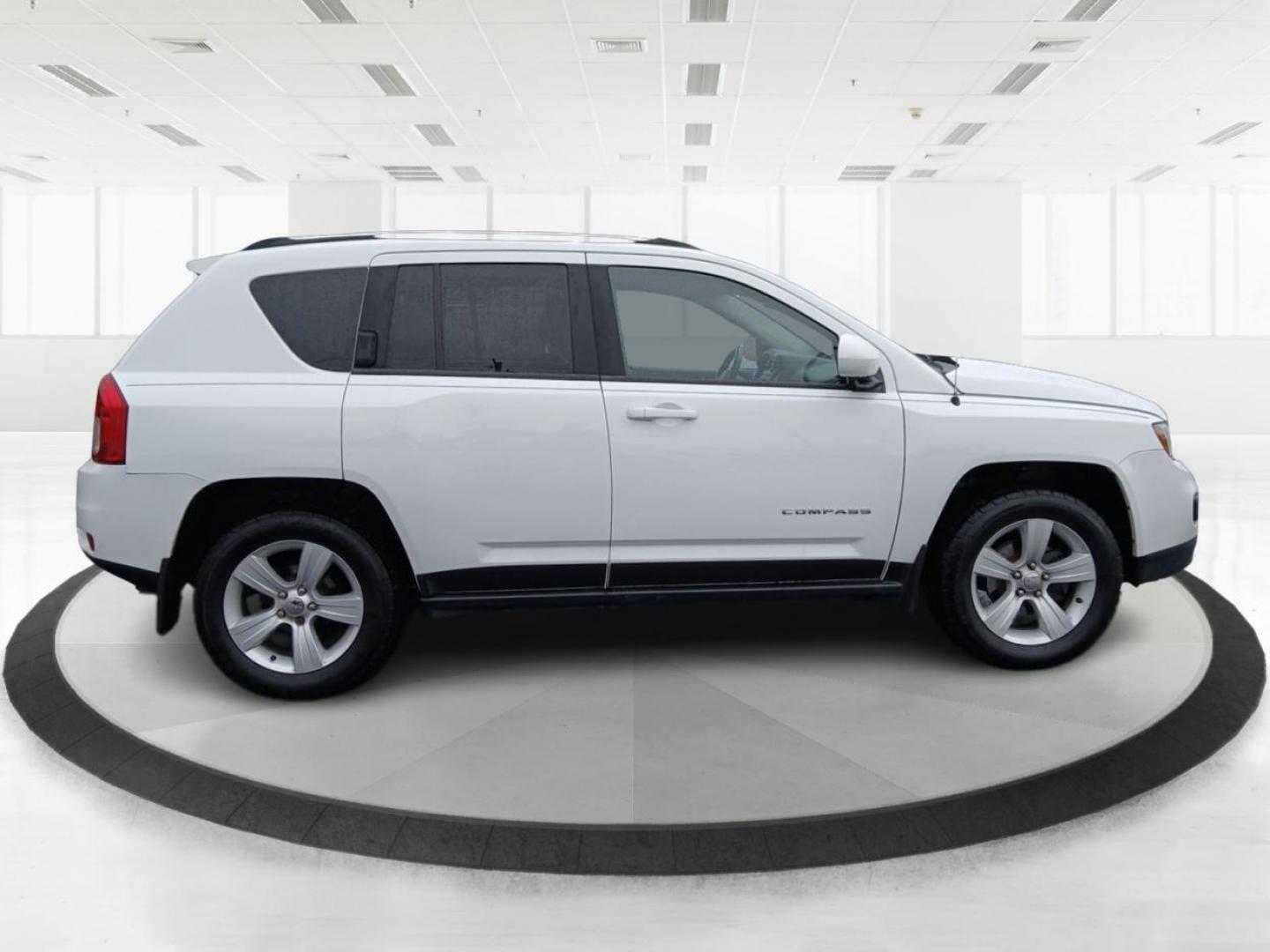 2015 Jeep Compass Latitude 4WD (1C4NJDEB2FD) with an 2.4L L4 DOHC 16V engine, 6-Speed Automatic transmission, located at 4508 South Dixie Dr, Moraine, OH, 45439, (937) 908-9800, 39.689976, -84.218452 - Photo#1