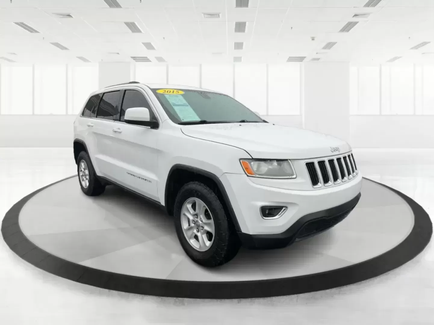 2015 Jeep Grand Cherokee Laredo (1C4RJFAG7FC) with an 3.6L V-6 DOHC engine, located at 8750 N County Rd 25A, Piqua, OH, 45356, (937) 908-9800, 40.164391, -84.232513 - Photo#0