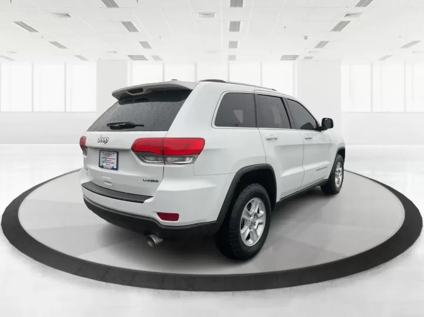 2015 Jeep Grand Cherokee Laredo (1C4RJFAG7FC) with an 3.6L V-6 DOHC engine, located at 8750 N County Rd 25A, Piqua, OH, 45356, (937) 908-9800, 40.164391, -84.232513 - Photo#2
