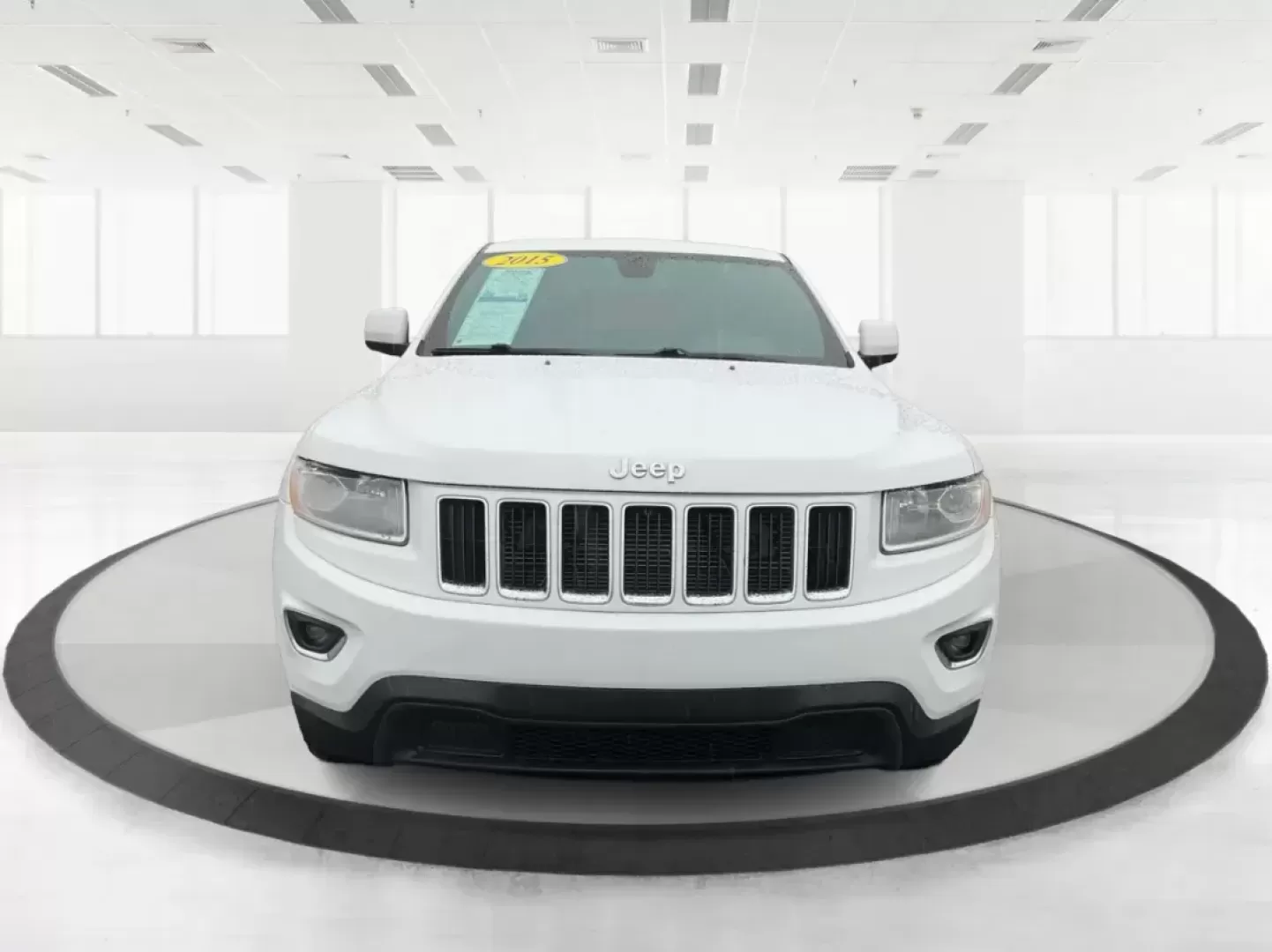 2015 Jeep Grand Cherokee Laredo (1C4RJFAG7FC) with an 3.6L V-6 DOHC engine, located at 8750 N County Rd 25A, Piqua, OH, 45356, (937) 908-9800, 40.164391, -84.232513 - Photo#6