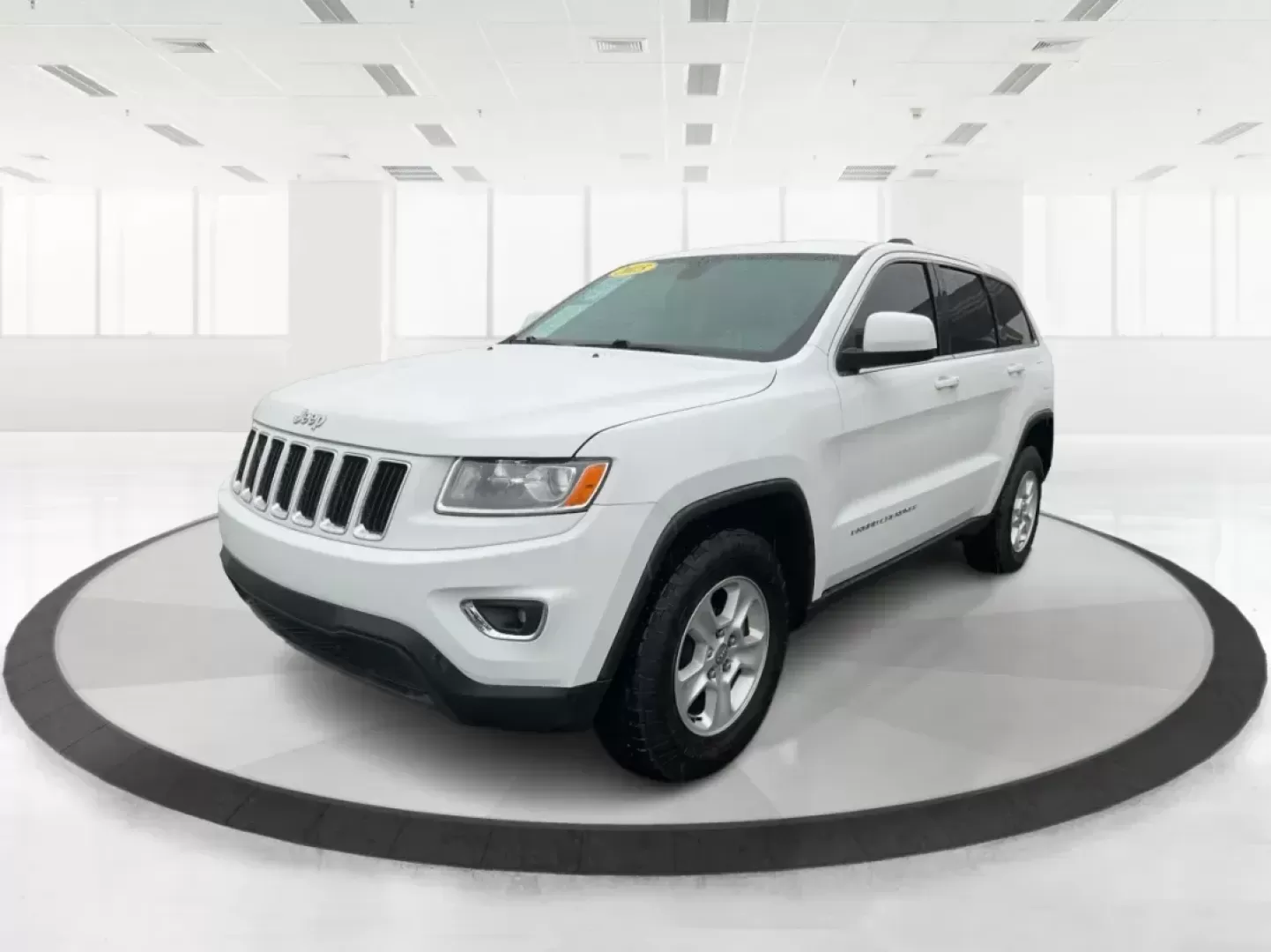 2015 Jeep Grand Cherokee Laredo (1C4RJFAG7FC) with an 3.6L V-6 DOHC engine, located at 8750 N County Rd 25A, Piqua, OH, 45356, (937) 908-9800, 40.164391, -84.232513 - Photo#7