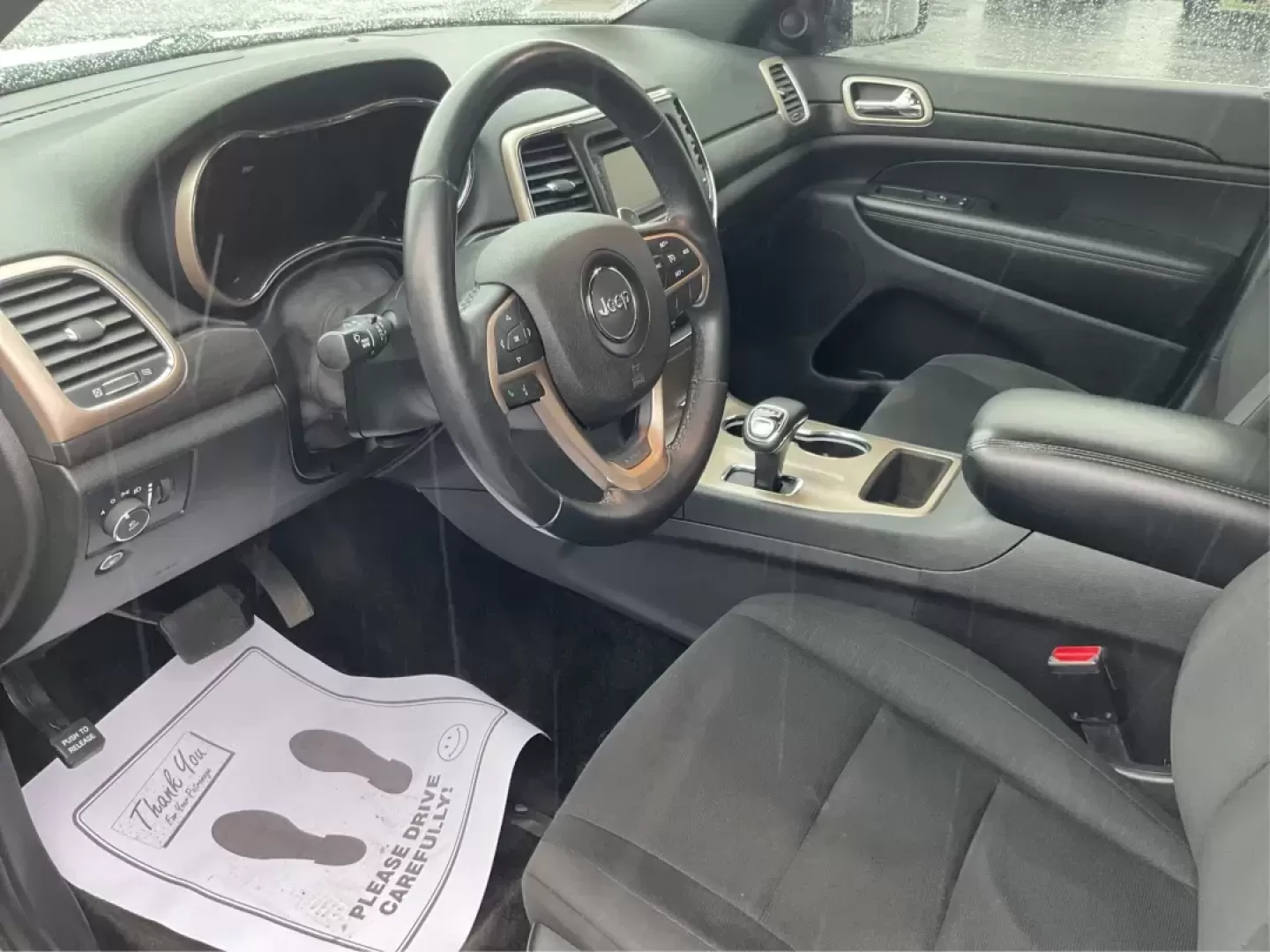 2015 Jeep Grand Cherokee Laredo (1C4RJFAG7FC) with an 3.6L V-6 DOHC engine, located at 8750 N County Rd 25A, Piqua, OH, 45356, (937) 908-9800, 40.164391, -84.232513 - Photo#8