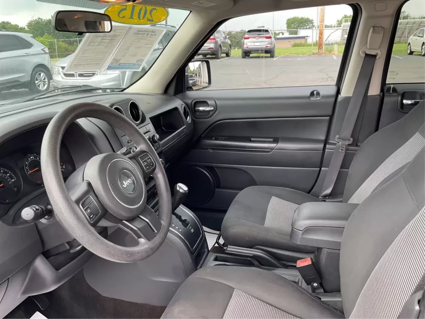 2015 Jeep Patriot Sport 2WD (1C4NJPBAXFD) with an 2.0L L4 DOHC 16V engine, located at 8750 N County Rd 25A, Piqua, OH, 45356, (937) 908-9800, 40.164391, -84.232513 - Photo#9