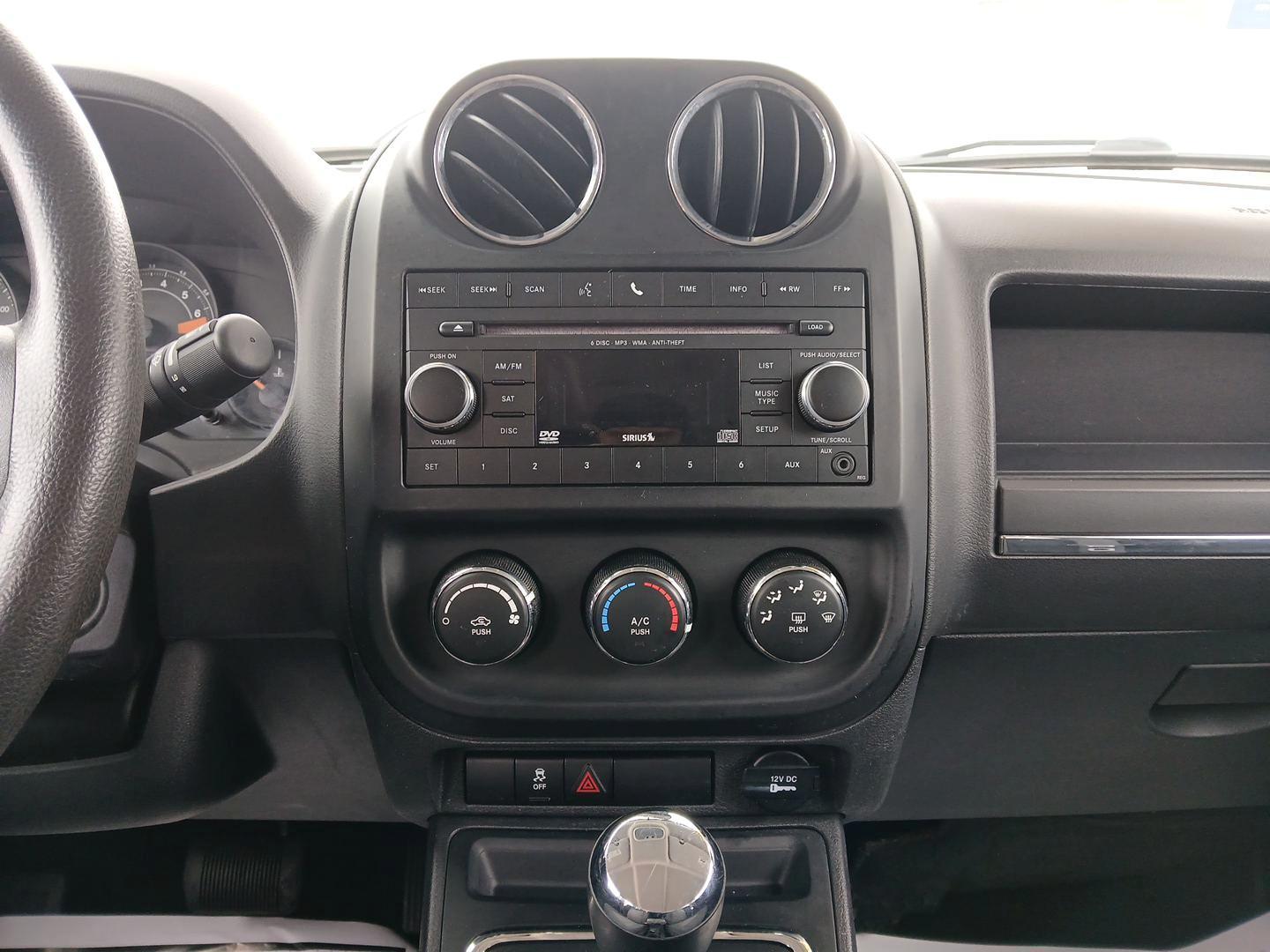 2015 Jeep Patriot Sport 4WD (1C4NJRBB7FD) with an 2.4L L4 DOHC 16V engine, located at 4508 South Dixie Dr, Moraine, OH, 45439, (937) 908-9800, 39.689976, -84.218452 - Photo#12