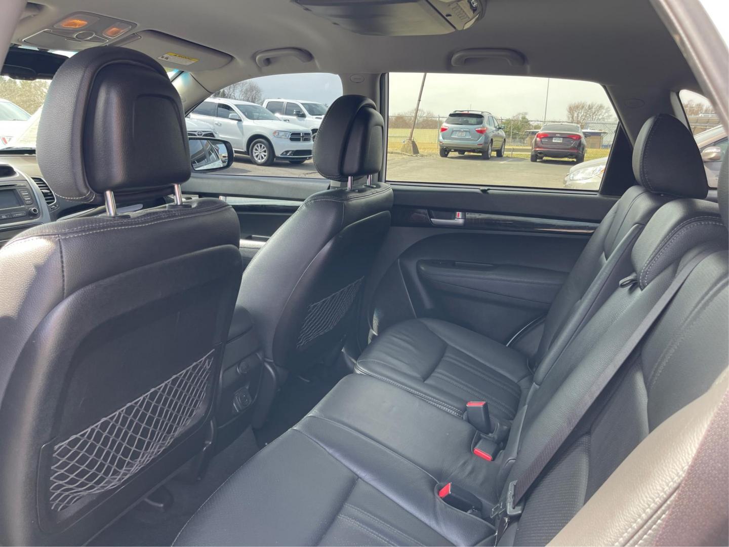 2015 Kia Sorento EX V6 (5XYKU4A74FG) with an Lambda II 3.3L V-6 gasoline direct injection engine, located at 8750 N County Rd 25A, Piqua, OH, 45356, (937) 908-9800, 40.164391, -84.232513 - Photo#9