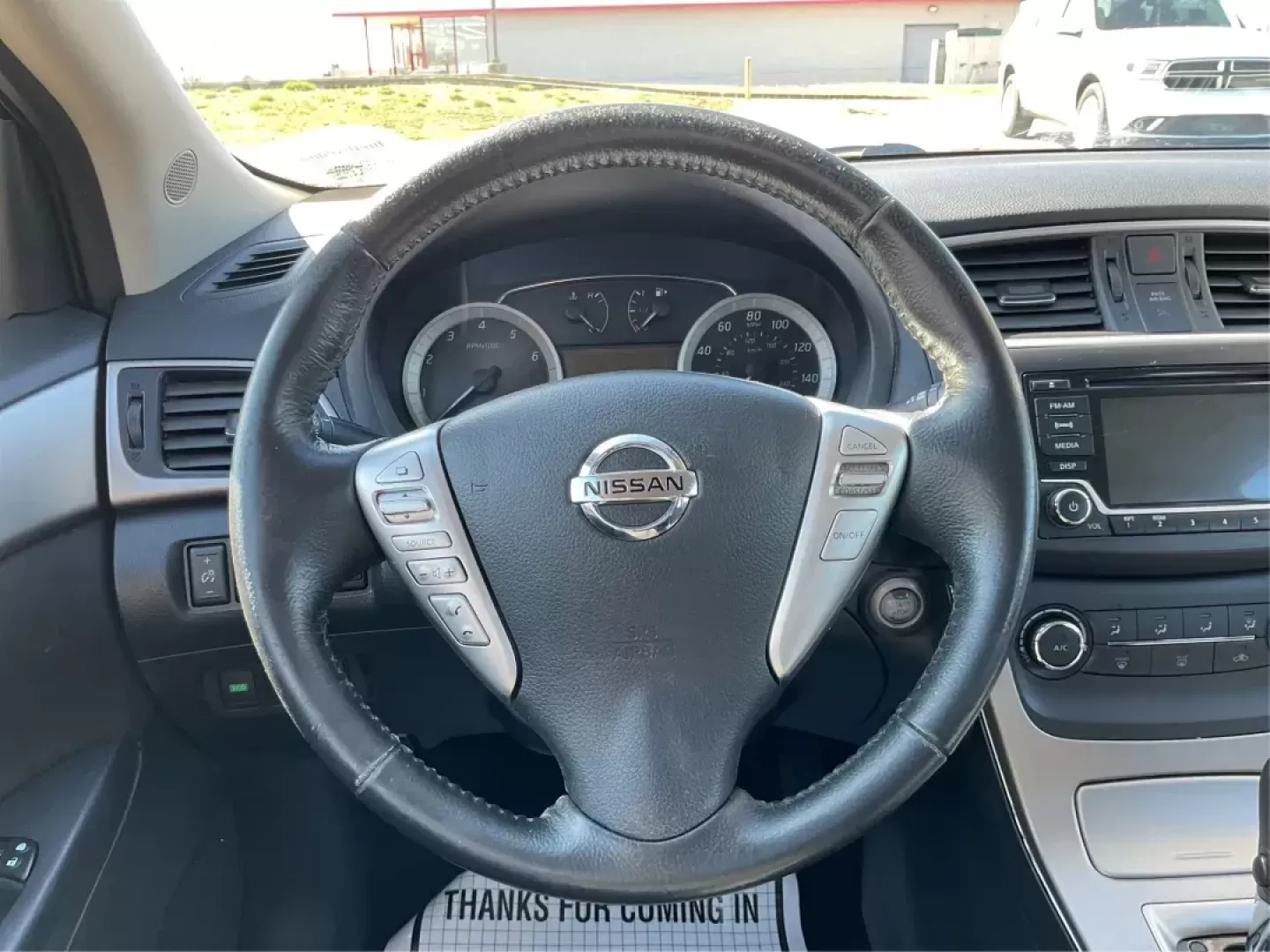 2015 Nissan Sentra SV (3N1AB7AP2FY) with an 1.8L I-4 DOHC engine, located at 880 E. National Road, Vandalia, OH, 45377, (937) 908-9800, 39.891918, -84.183594 - Photo#15
