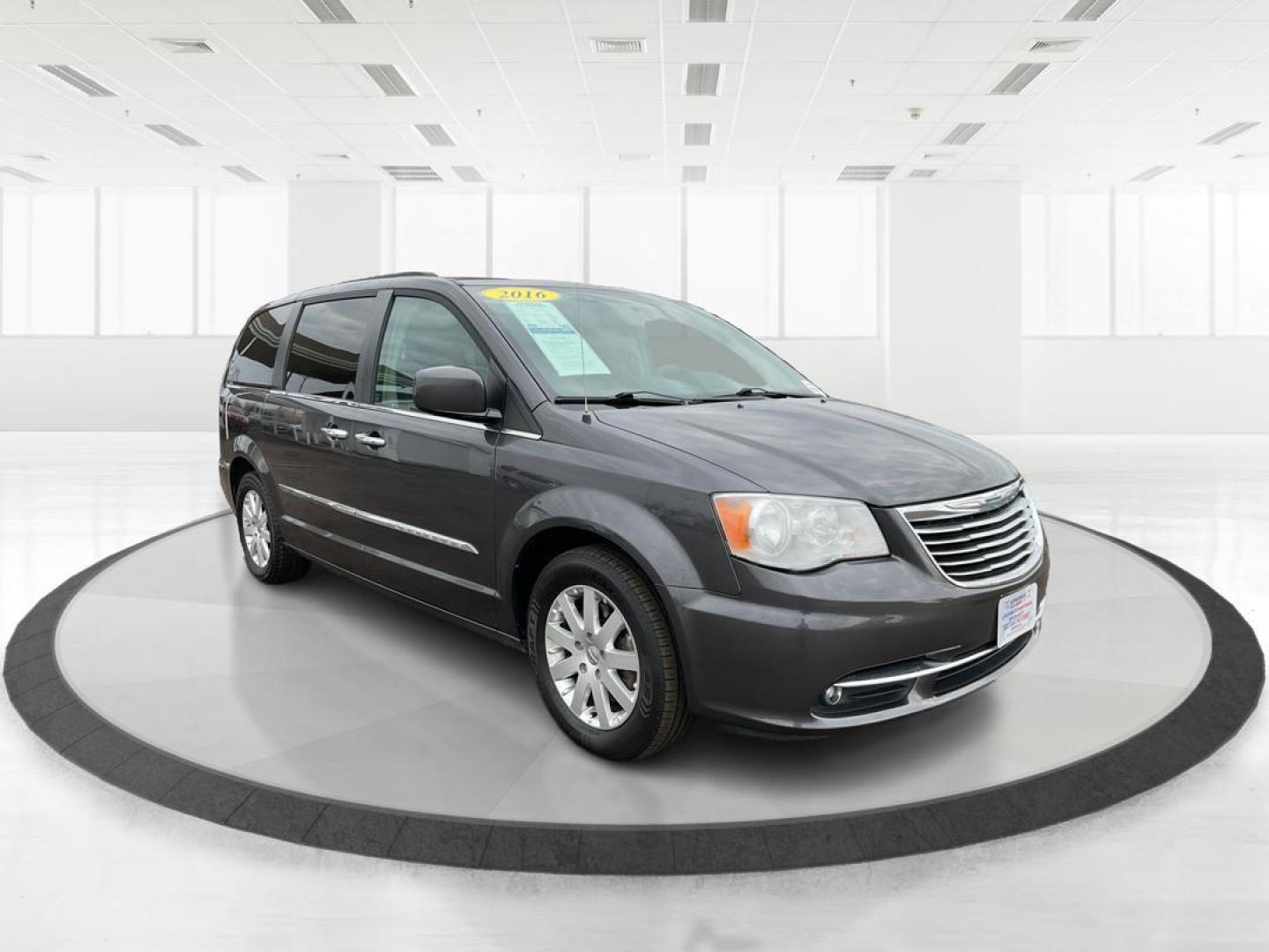 2016 Chrysler Town and Country Touring (2C4RC1BG4GR) with an 3.6L V6 DOHC 24V engine, 6-Speed Automatic transmission, located at 8750 N County Rd 25A, Piqua, OH, 45356, (937) 908-9800, 40.164391, -84.232513 - Photo#0