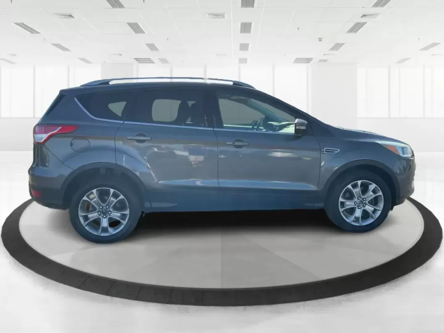 2016 Ford Escape Titanium (1FMCU9J92GU) with an EcoBoost 1.6L I-4 gasoline direct injection engine, located at 1184 Kauffman Ave, Fairborn, OH, 45324, (937) 908-9800, 39.807072, -84.030914 - Photo#0