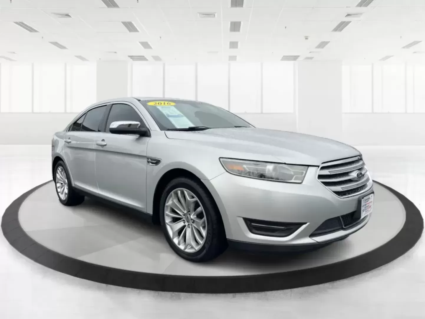 2016 Ford Taurus Limited (1FAHP2F82GG) with an EcoBoost 2L I-4 gasoline direct injection engine, located at 8750 N County Rd 25A, Piqua, OH, 45356, (937) 908-9800, 40.164391, -84.232513 - Photo#0