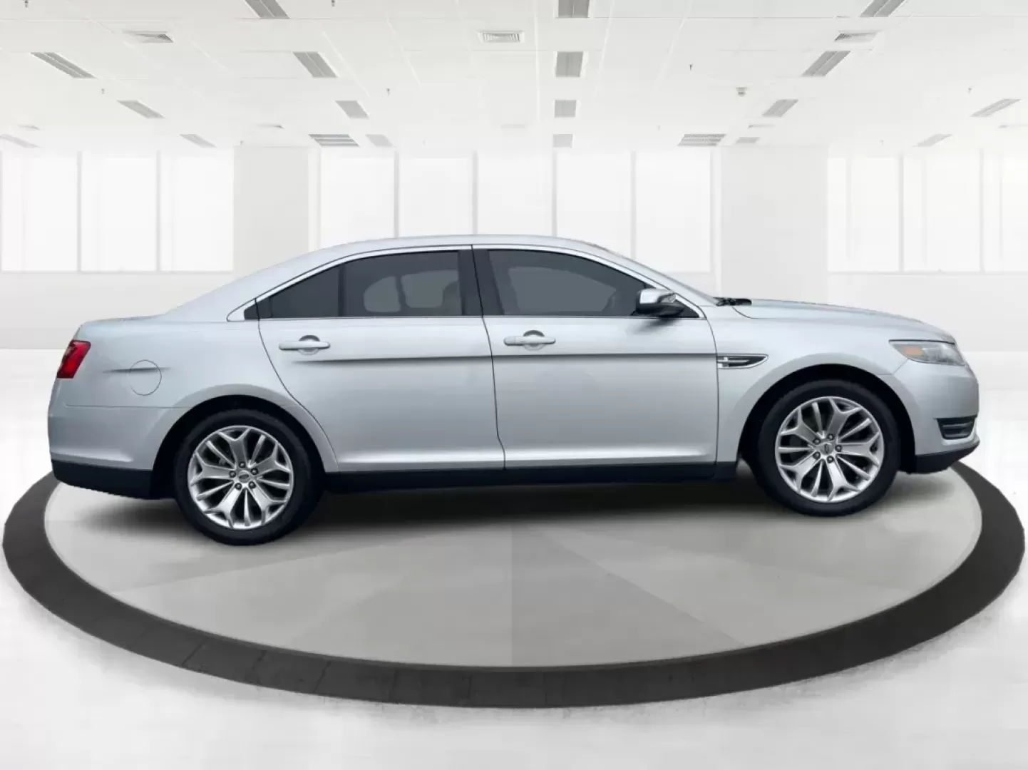 2016 Ford Taurus Limited (1FAHP2F82GG) with an EcoBoost 2L I-4 gasoline direct injection engine, located at 8750 N County Rd 25A, Piqua, OH, 45356, (937) 908-9800, 40.164391, -84.232513 - Photo#1
