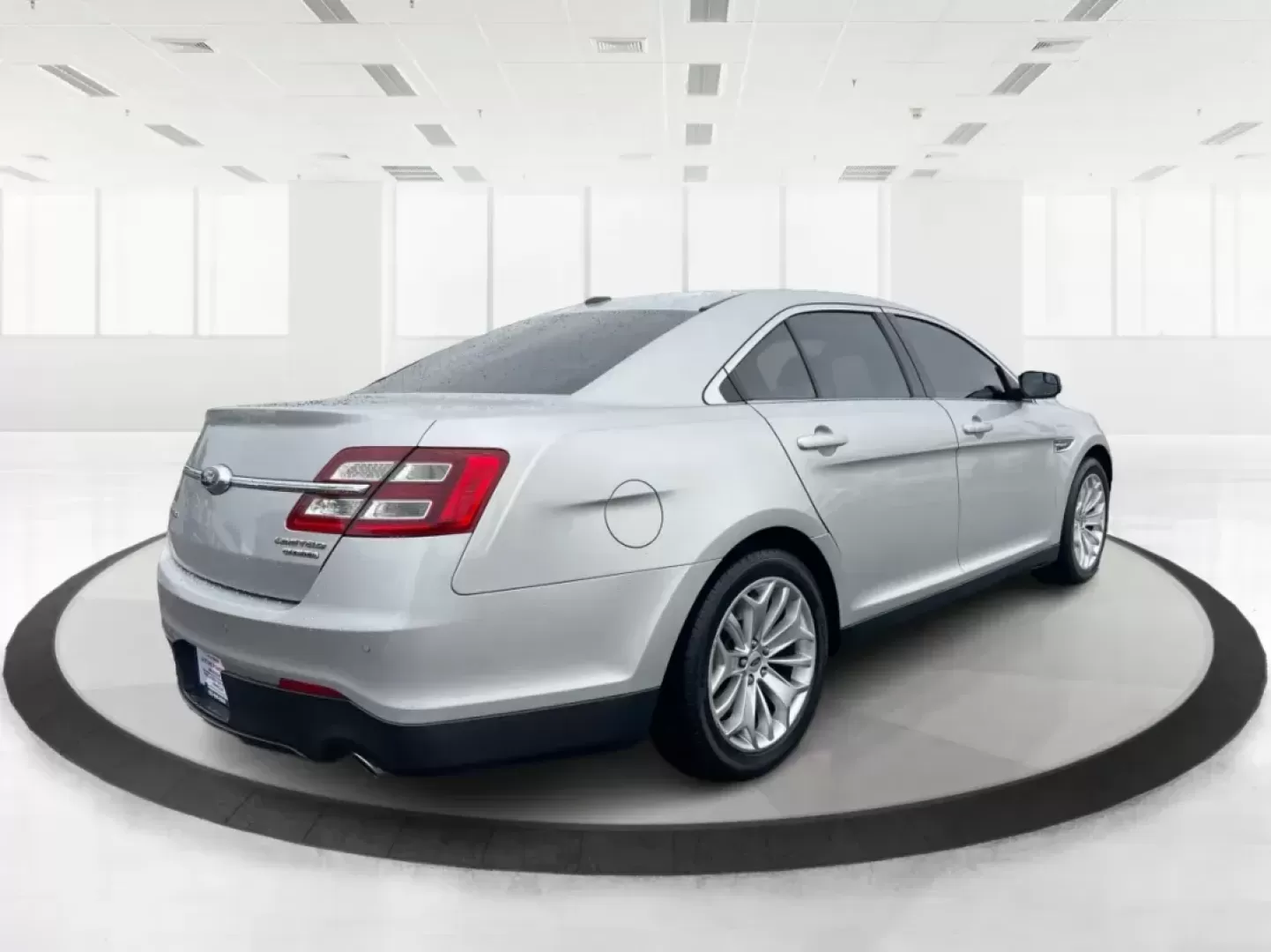 2016 Ford Taurus Limited (1FAHP2F82GG) with an EcoBoost 2L I-4 gasoline direct injection engine, located at 8750 N County Rd 25A, Piqua, OH, 45356, (937) 908-9800, 40.164391, -84.232513 - Photo#2