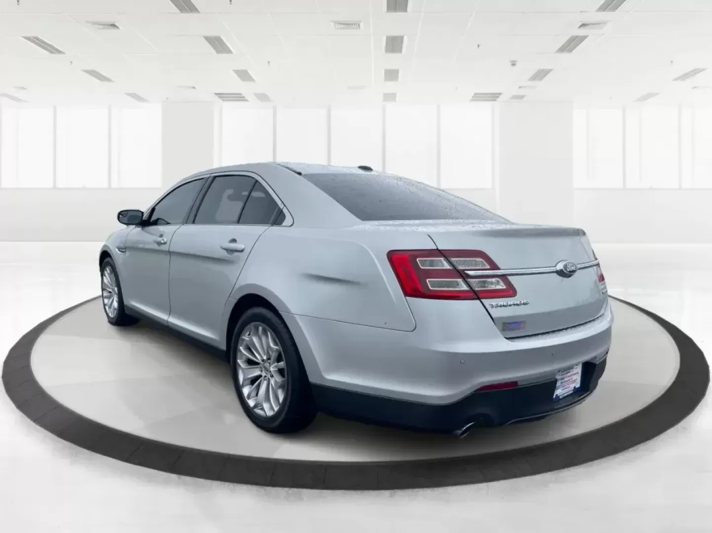 2016 Ford Taurus Limited (1FAHP2F82GG) with an EcoBoost 2L I-4 gasoline direct injection engine, located at 8750 N County Rd 25A, Piqua, OH, 45356, (937) 908-9800, 40.164391, -84.232513 - Photo#4