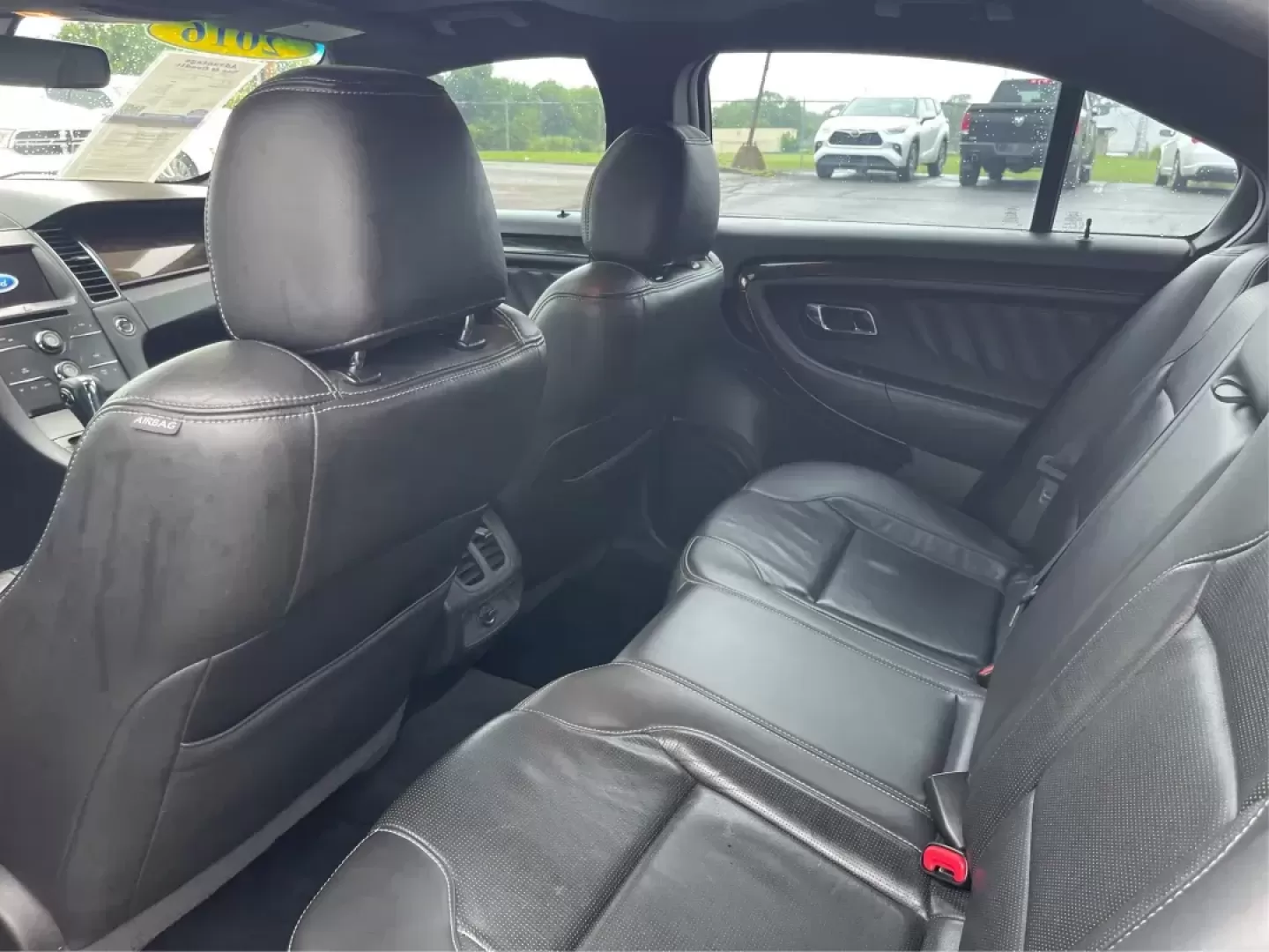 2016 Ford Taurus Limited (1FAHP2F82GG) with an EcoBoost 2L I-4 gasoline direct injection engine, located at 8750 N County Rd 25A, Piqua, OH, 45356, (937) 908-9800, 40.164391, -84.232513 - Photo#9