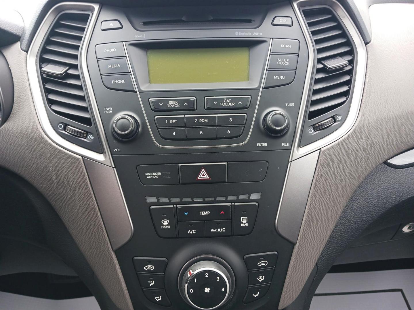 2016 Hyundai Santa Fe Sport 2.4 FWD (5XYZT3LB2GG) with an 2.4L L4 DOHC 16V engine, 6-Speed Automatic transmission, located at 4508 South Dixie Dr, Moraine, OH, 45439, (937) 908-9800, 39.689976, -84.218452 - Photo#12