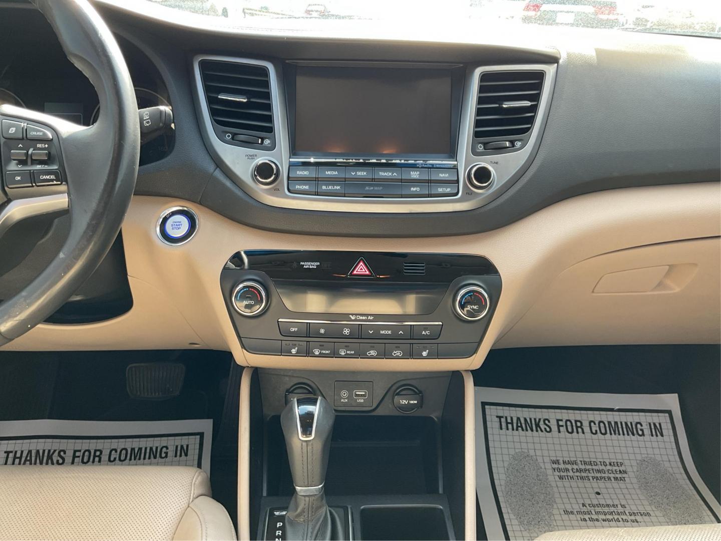 2016 Hyundai Tucson Limited (KM8J3CA20GU) with an 1.6L I-4 gasoline direct injection engine, located at 1099 N County Rd 25A , Troy, OH, 45373, (937) 908-9800, 40.057079, -84.212883 - Photo#12