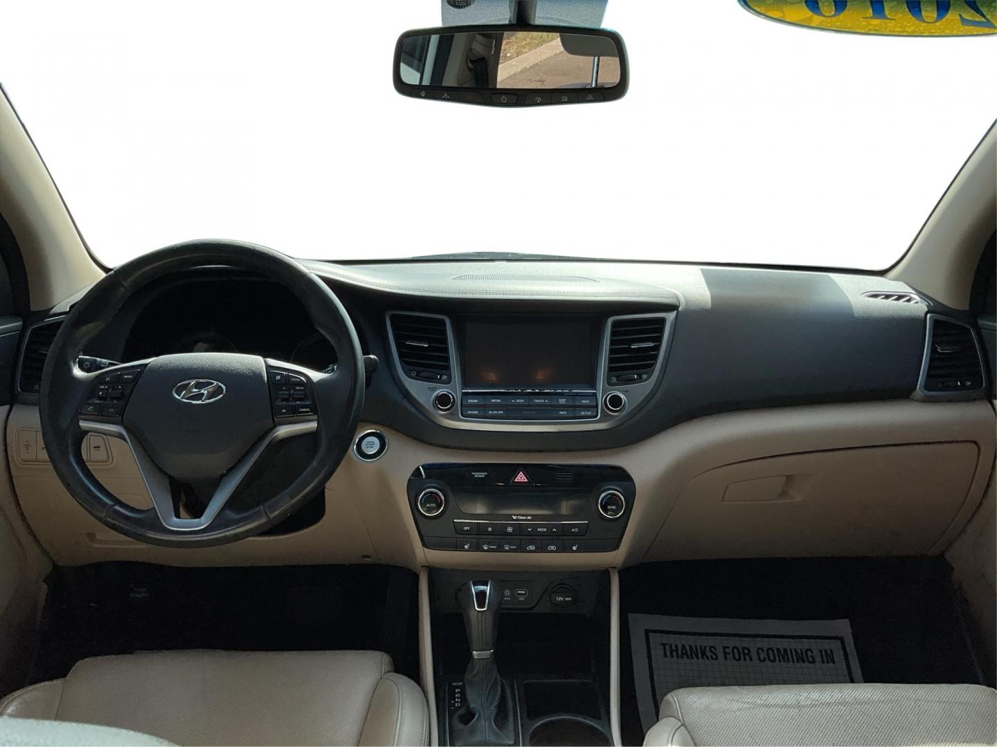 2016 Hyundai Tucson Limited (KM8J3CA20GU) with an 1.6L I-4 gasoline direct injection engine, located at 1099 N County Rd 25A , Troy, OH, 45373, (937) 908-9800, 40.057079, -84.212883 - Photo#20