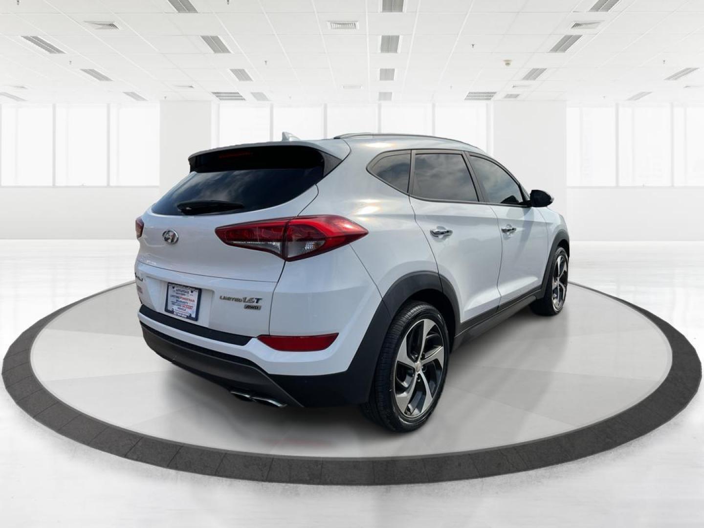 2016 Hyundai Tucson Limited (KM8J3CA20GU) with an 1.6L I-4 gasoline direct injection engine, located at 1099 N County Rd 25A , Troy, OH, 45373, (937) 908-9800, 40.057079, -84.212883 - Photo#2
