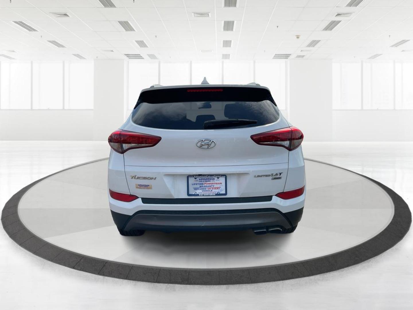 2016 Hyundai Tucson Limited (KM8J3CA20GU) with an 1.6L I-4 gasoline direct injection engine, located at 1099 N County Rd 25A , Troy, OH, 45373, (937) 908-9800, 40.057079, -84.212883 - Photo#3