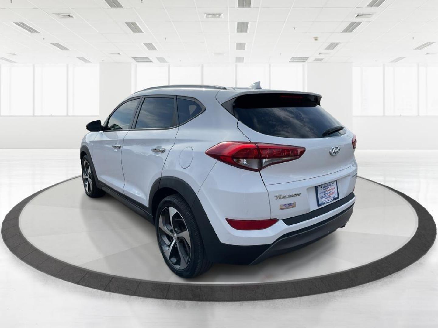 2016 Hyundai Tucson Limited (KM8J3CA20GU) with an 1.6L I-4 gasoline direct injection engine, located at 1099 N County Rd 25A , Troy, OH, 45373, (937) 908-9800, 40.057079, -84.212883 - Photo#4