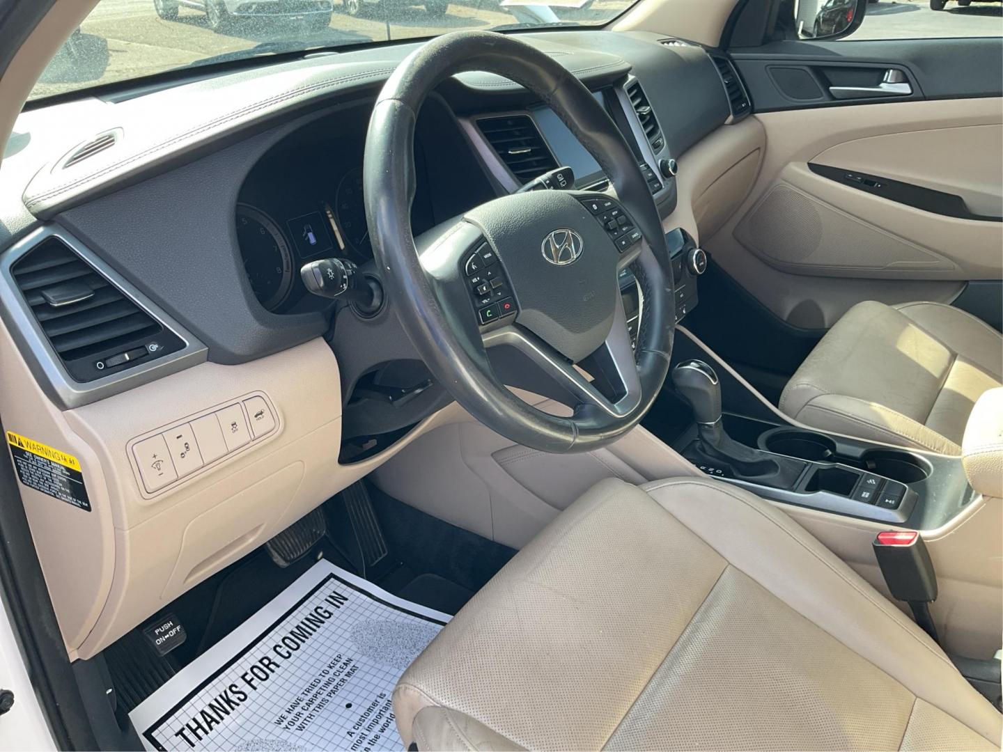 2016 Hyundai Tucson Limited (KM8J3CA20GU) with an 1.6L I-4 gasoline direct injection engine, located at 1099 N County Rd 25A , Troy, OH, 45373, (937) 908-9800, 40.057079, -84.212883 - Photo#8