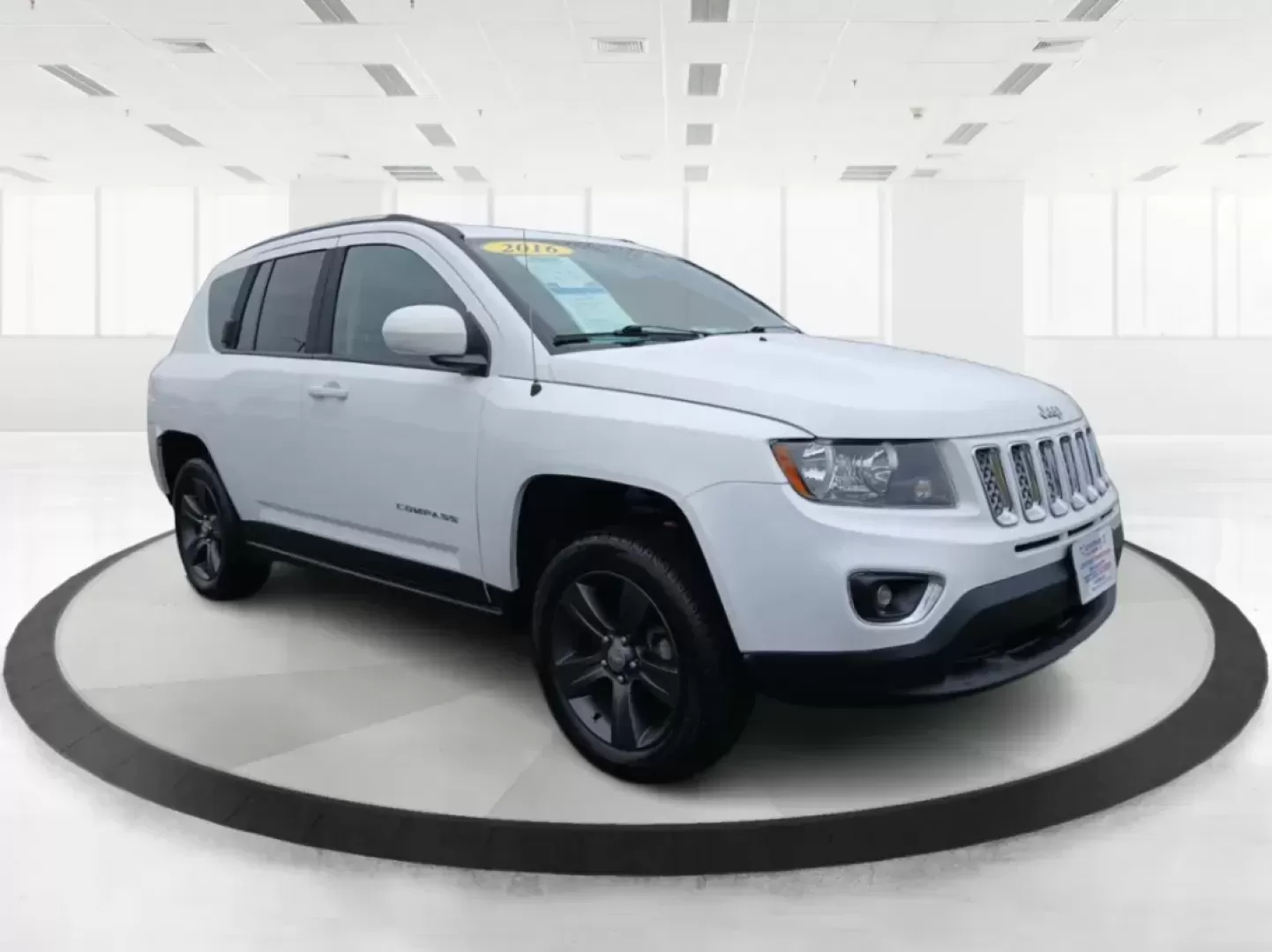 2016 Jeep Compass Latitude FWD (1C4NJCEA3GD) with an 2.0L L4 DOHC 16V engine, Continuously Variable Transmission transmission, located at 880 E. National Road, Vandalia, OH, 45377, (937) 908-9800, 39.891918, -84.183594 - Photo#0