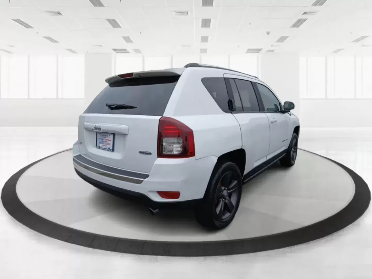 2016 Jeep Compass Latitude FWD (1C4NJCEA3GD) with an 2.0L L4 DOHC 16V engine, Continuously Variable Transmission transmission, located at 880 E. National Road, Vandalia, OH, 45377, (937) 908-9800, 39.891918, -84.183594 - Photo#2