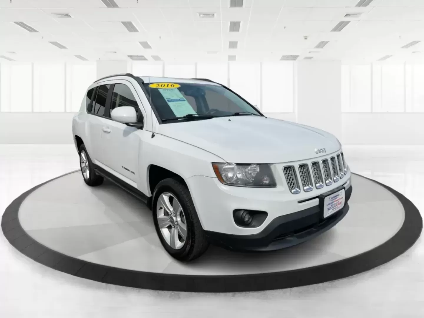 2016 Jeep Compass Latitude (1C4NJDEB9GD) with an 2.4L I-4 DOHC engine, located at 401 Woodman Dr, Riverside, OH, 45431, (937) 908-9800, 39.760899, -84.123421 - Photo#0