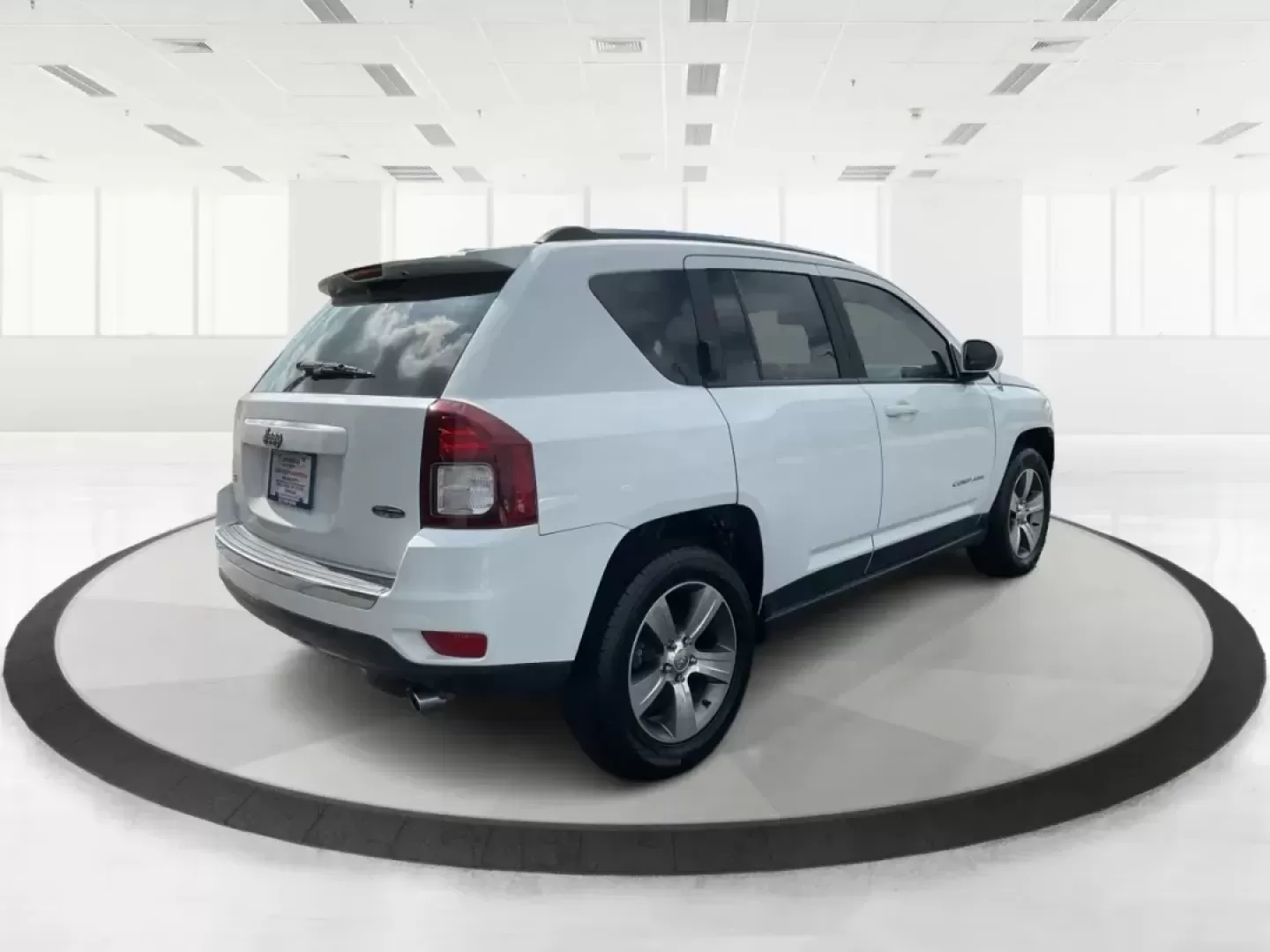 2016 Jeep Compass High Altitude Edition (1C4NJDEB6GD) with an 2.4L I-4 DOHC engine, located at 8750 N County Rd 25A, Piqua, OH, 45356, (937) 908-9800, 40.164391, -84.232513 - Photo#2