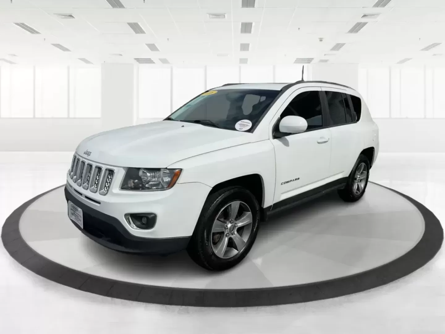 2016 Jeep Compass High Altitude Edition (1C4NJDEB6GD) with an 2.4L I-4 DOHC engine, located at 8750 N County Rd 25A, Piqua, OH, 45356, (937) 908-9800, 40.164391, -84.232513 - Photo#7