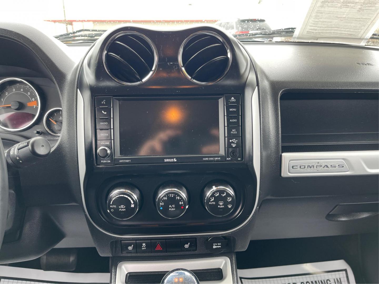 2016 Jeep Compass High Altitude (1C4NJCEA4GD) with an Other engine, located at 4508 South Dixie Dr, Moraine, OH, 45439, (937) 908-9800, 39.689976, -84.218452 - Photo#11