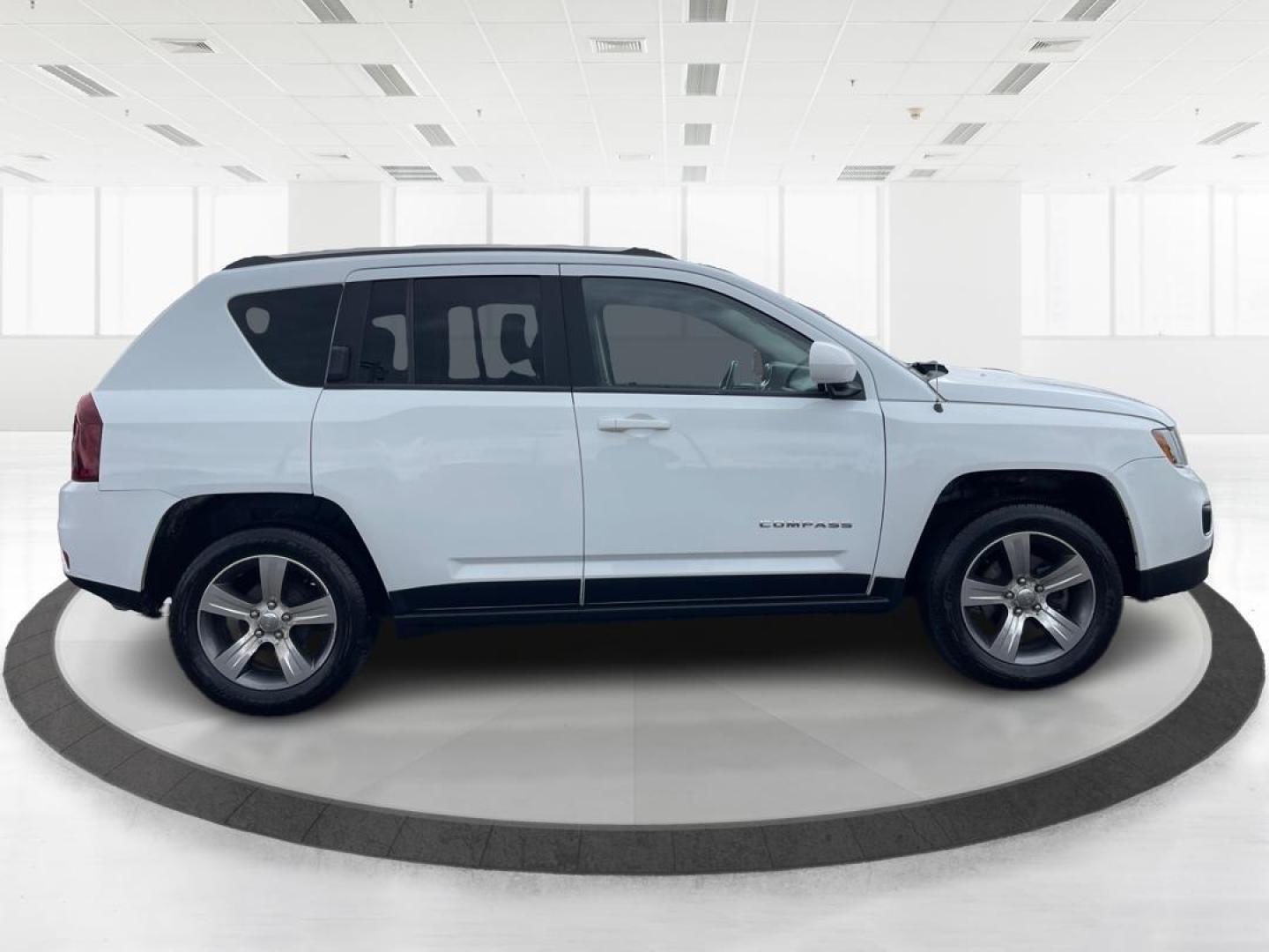 2016 Jeep Compass High Altitude (1C4NJCEA4GD) with an Other engine, located at 4508 South Dixie Dr, Moraine, OH, 45439, (937) 908-9800, 39.689976, -84.218452 - Photo#1