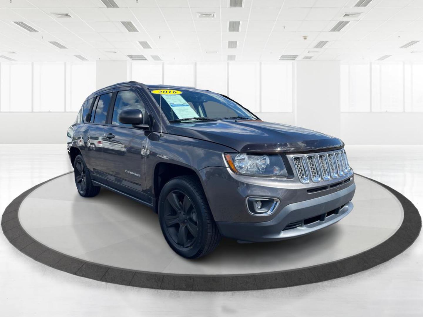 2016 Jeep Compass High Altitude Edition (1C4NJCEA4GD) with an 2L I-4 DOHC engine, located at 401 Woodman Dr, Riverside, OH, 45431, (937) 908-9800, 39.760899, -84.123421 - Photo#0