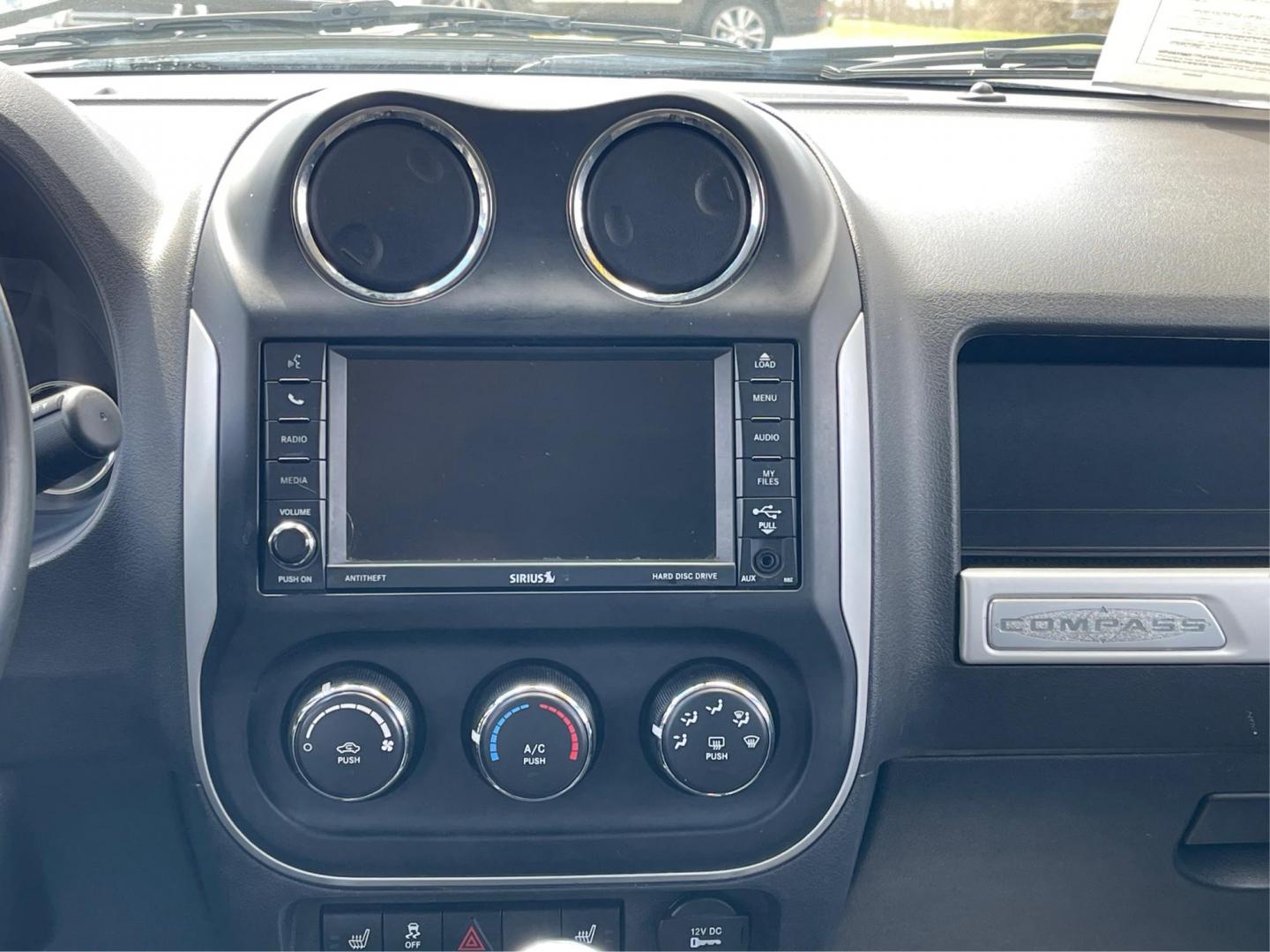 2016 Jeep Compass High Altitude Edition (1C4NJCEA4GD) with an 2L I-4 DOHC engine, located at 401 Woodman Dr, Riverside, OH, 45431, (937) 908-9800, 39.760899, -84.123421 - Photo#11