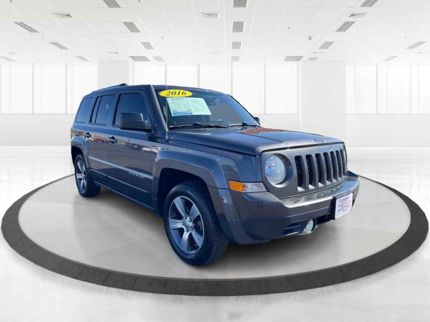 2016 Jeep Patriot High Altitude Edition (1C4NJPFAXGD) with an 2L I-4 DOHC engine, located at 8750 N County Rd 25A, Piqua, OH, 45356, (937) 908-9800, 40.164391, -84.232513 - Photo#0
