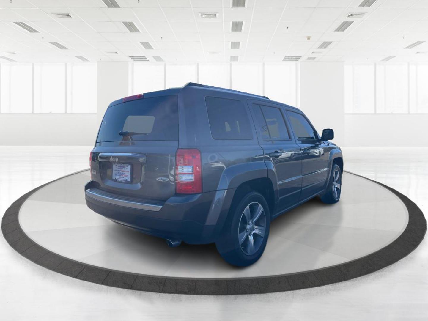2016 Jeep Patriot High Altitude Edition (1C4NJPFAXGD) with an 2L I-4 DOHC engine, located at 8750 N County Rd 25A, Piqua, OH, 45356, (937) 908-9800, 40.164391, -84.232513 - Photo#2