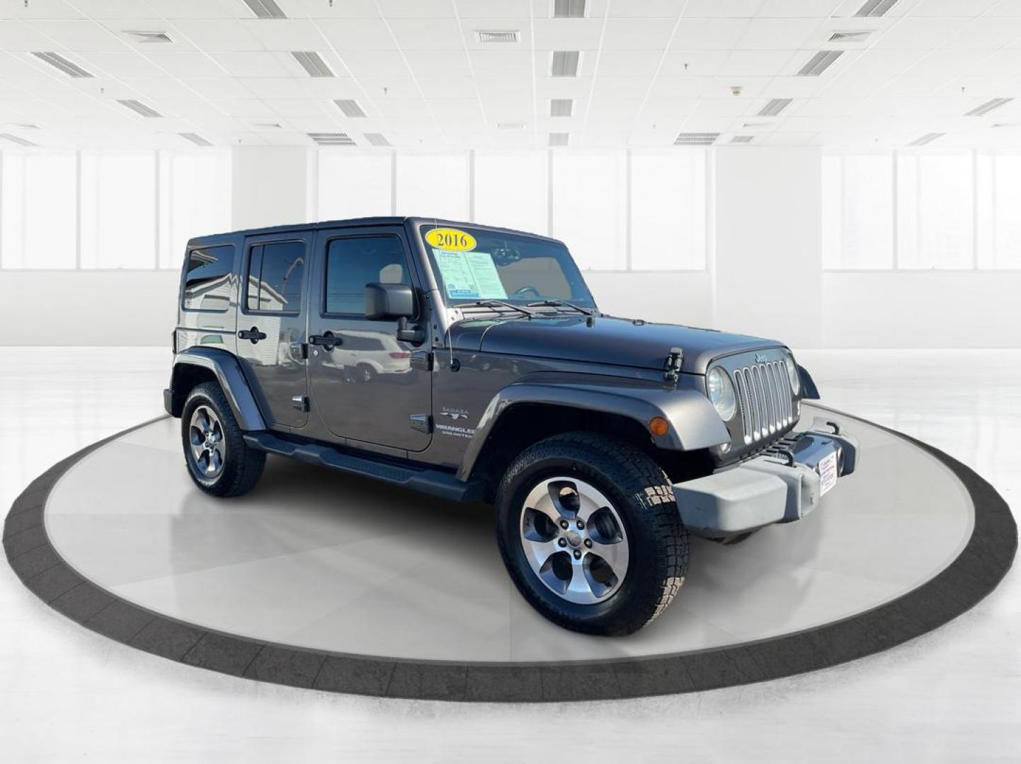 2016 Jeep Wrangler Unlimited Sahara 4WD (1C4BJWEG2GL) with an 3.6L V6 DOHC 24V FFV engine, located at 8750 N County Rd 25A, Piqua, OH, 45356, (937) 908-9800, 40.164391, -84.232513 - Photo#0