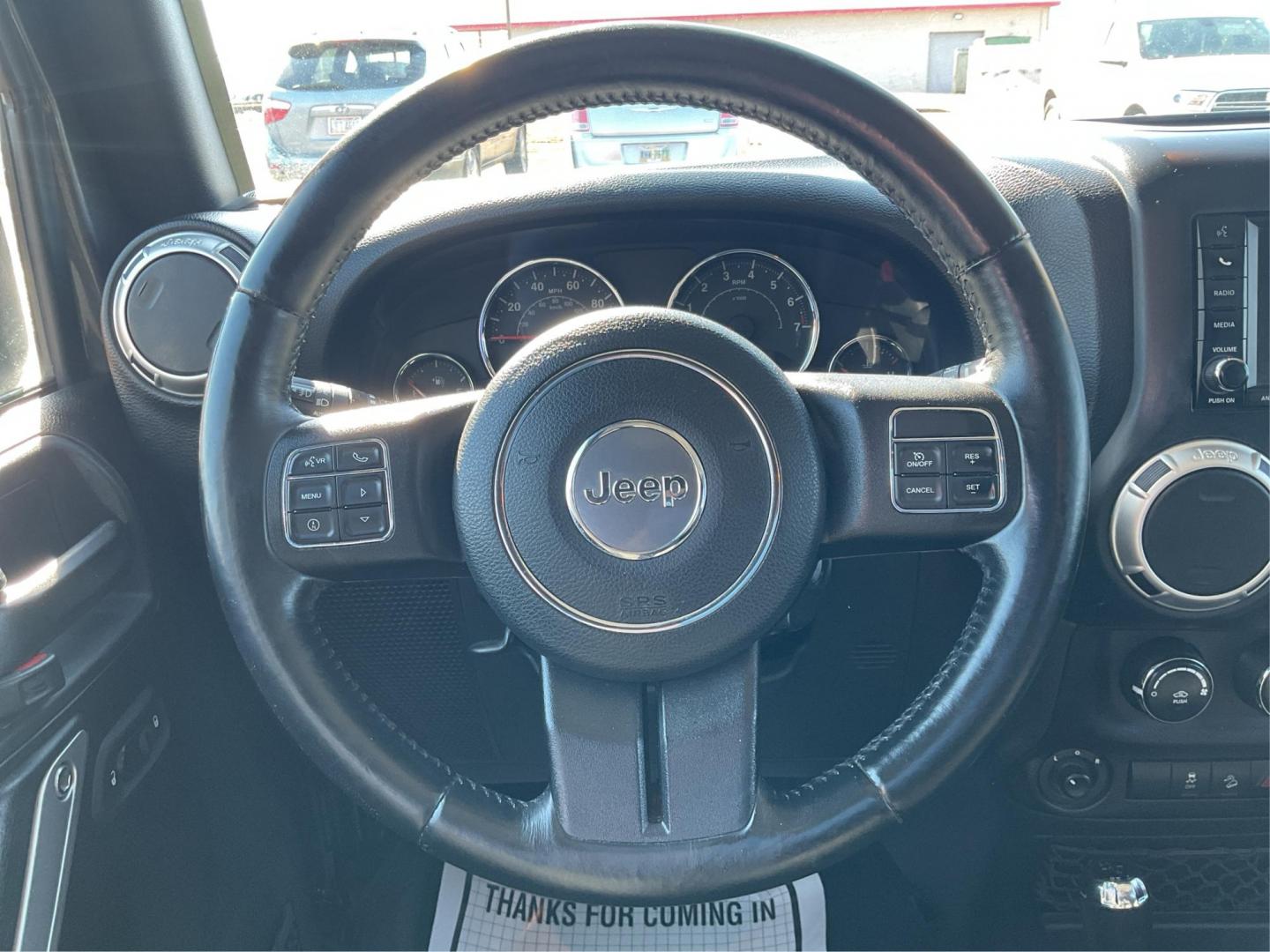 2016 Jeep Wrangler Unlimited Sahara 4WD (1C4BJWEG2GL) with an 3.6L V6 DOHC 24V FFV engine, located at 8750 N County Rd 25A, Piqua, OH, 45356, (937) 908-9800, 40.164391, -84.232513 - Photo#14