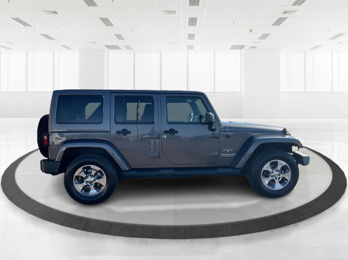 2016 Jeep Wrangler Unlimited Sahara 4WD (1C4BJWEG2GL) with an 3.6L V6 DOHC 24V FFV engine, located at 8750 N County Rd 25A, Piqua, OH, 45356, (937) 908-9800, 40.164391, -84.232513 - Photo#1