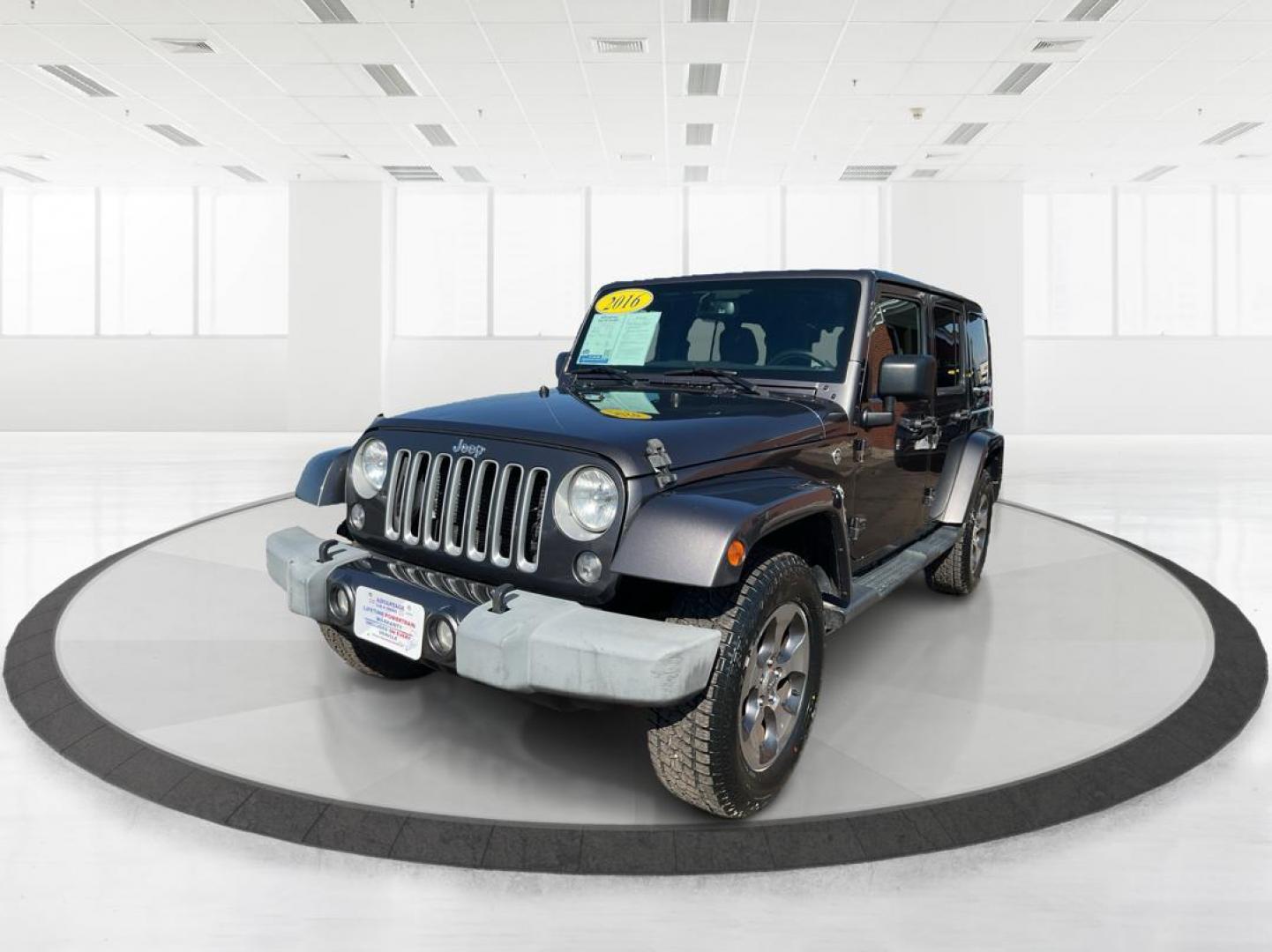 2016 Jeep Wrangler Unlimited Sahara 4WD (1C4BJWEG2GL) with an 3.6L V6 DOHC 24V FFV engine, located at 8750 N County Rd 25A, Piqua, OH, 45356, (937) 908-9800, 40.164391, -84.232513 - Photo#6