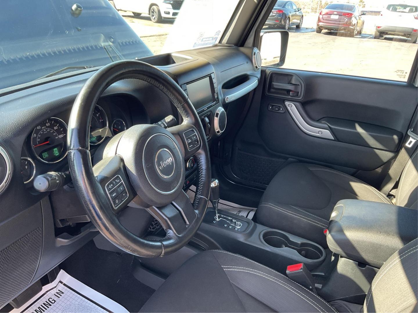 2016 Jeep Wrangler Unlimited Sahara 4WD (1C4BJWEG2GL) with an 3.6L V6 DOHC 24V FFV engine, located at 8750 N County Rd 25A, Piqua, OH, 45356, (937) 908-9800, 40.164391, -84.232513 - Photo#7