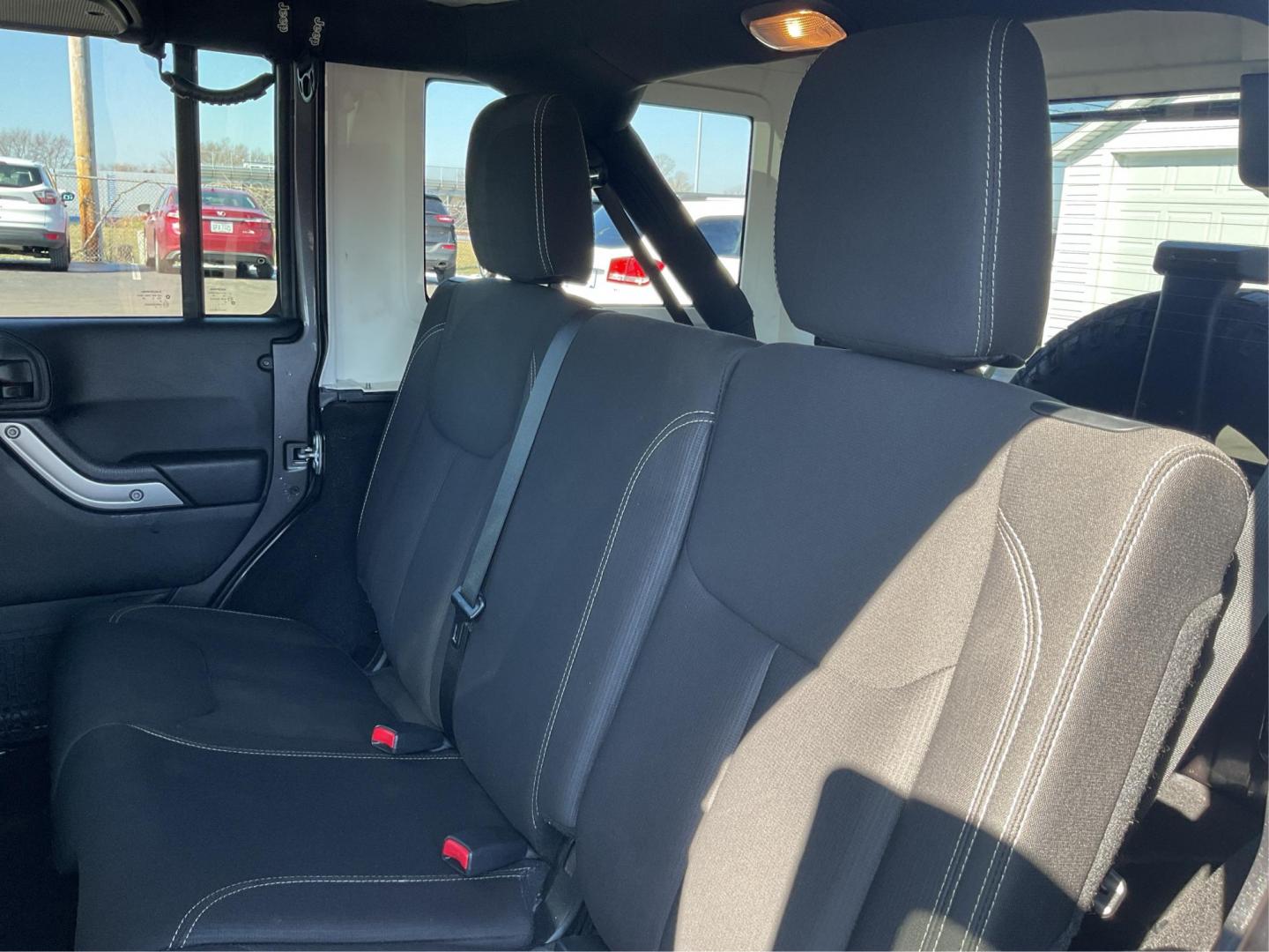 2016 Jeep Wrangler Unlimited Sahara 4WD (1C4BJWEG2GL) with an 3.6L V6 DOHC 24V FFV engine, located at 8750 N County Rd 25A, Piqua, OH, 45356, (937) 908-9800, 40.164391, -84.232513 - Photo#8