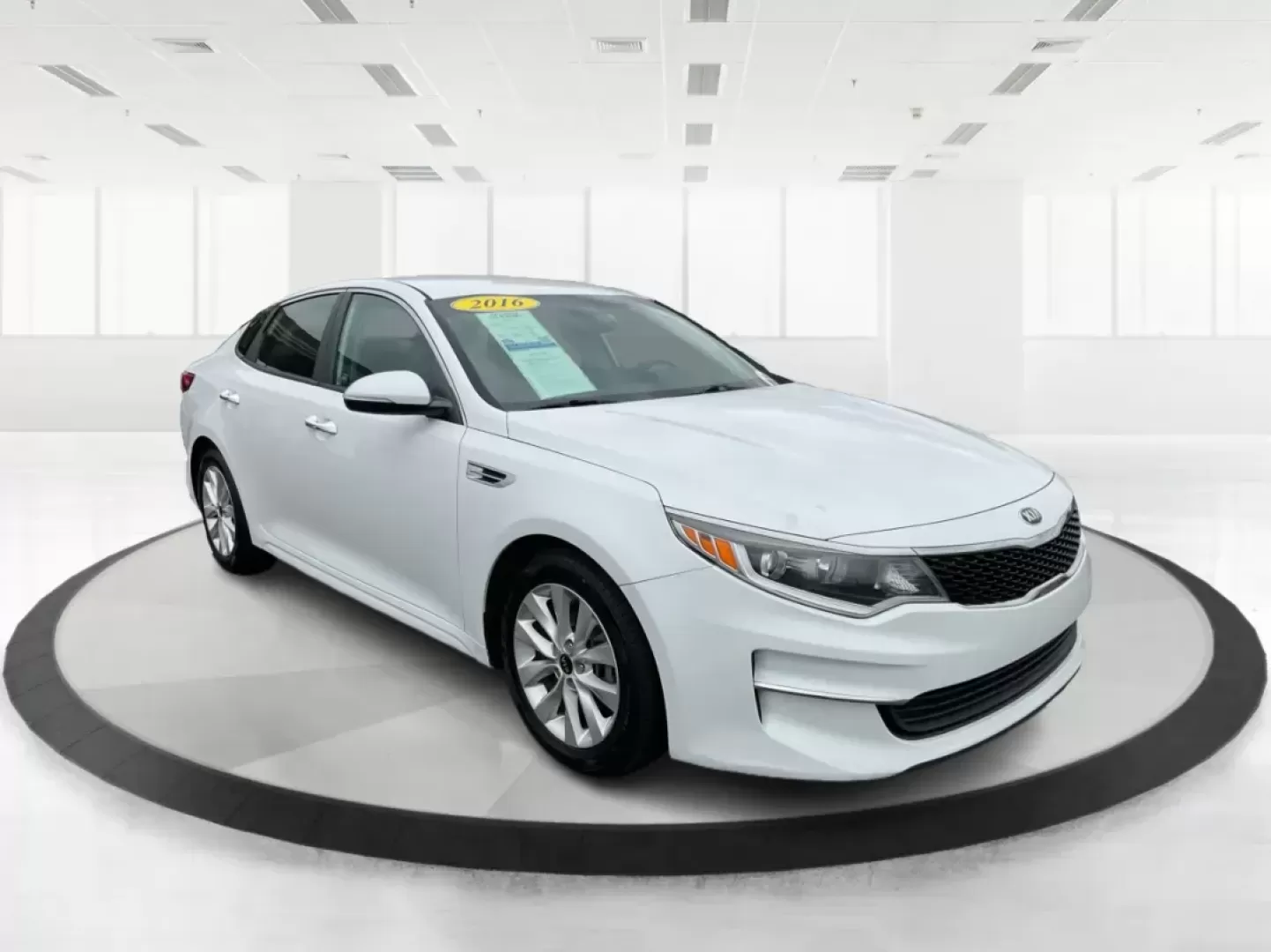 2016 Kia Optima LX (5XXGT4L32GG) with an Theta II 2.4L I-4 gasoline direct injection engine, located at 4508 South Dixie Dr, Moraine, OH, 45439, (937) 908-9800, 39.689976, -84.218452 - Photo#0